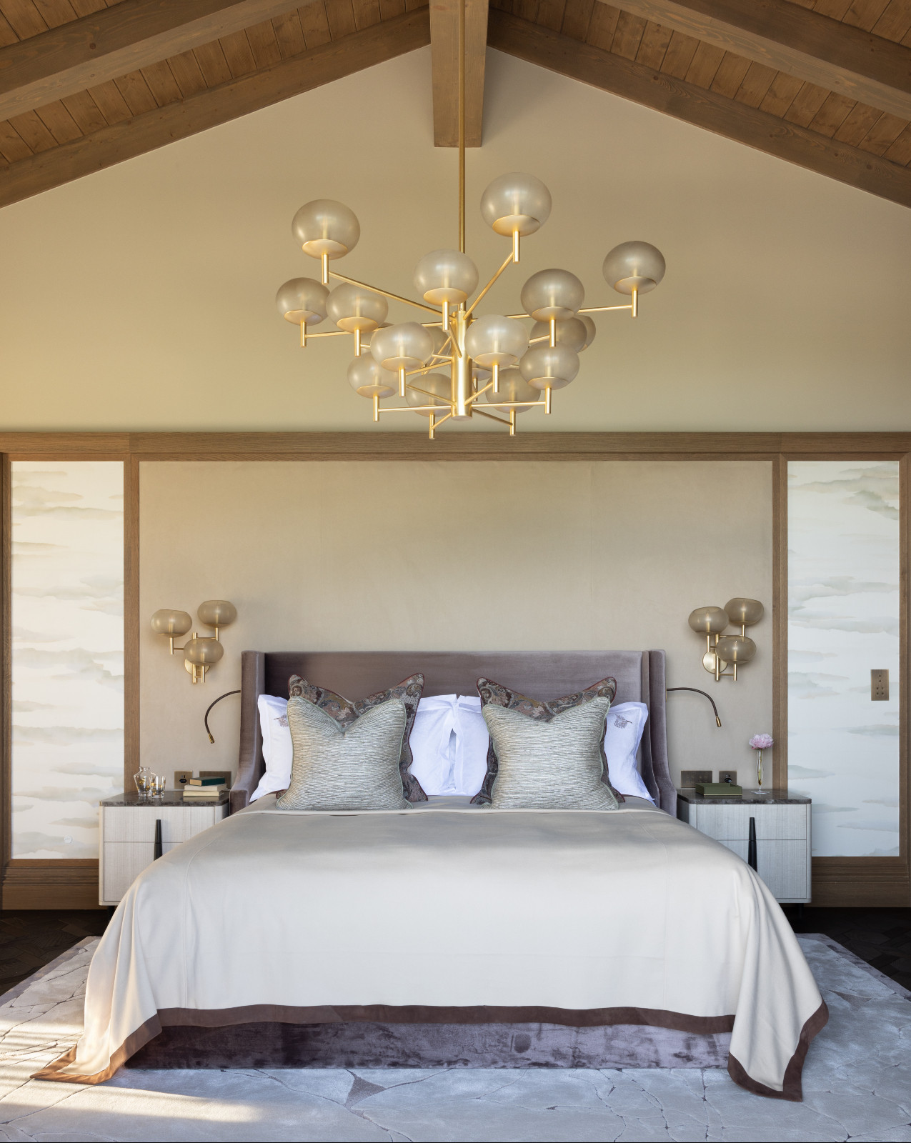 A bedroom in a multigenerational family chalet in the Swiss Alps designed by Portia Fox Interiors