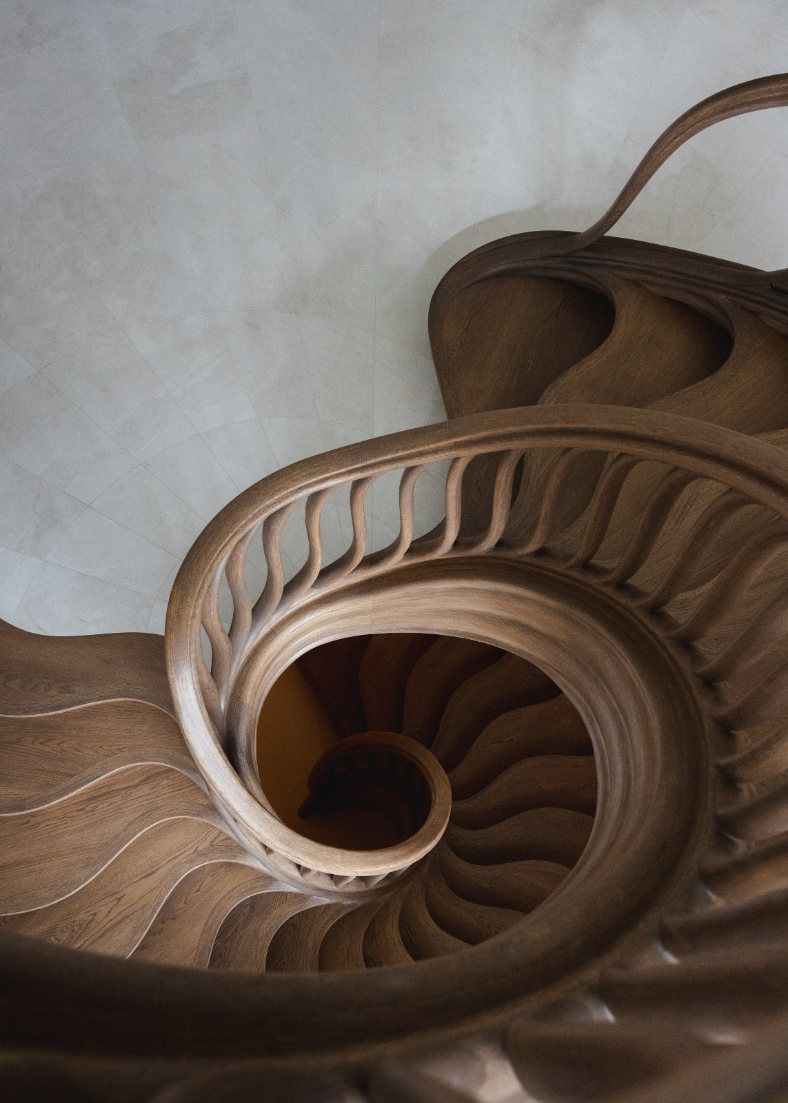 The staircase in a multigenerational family chalet in the Swiss Alps designed by Portia Fox Interiors