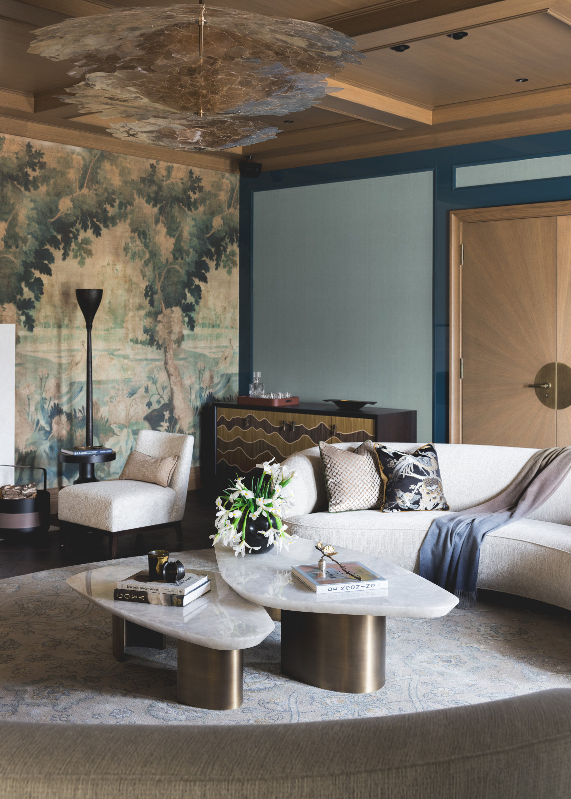 The living room in a multigenerational family chalet in the Swiss Alps designed by Portia Fox Interiors