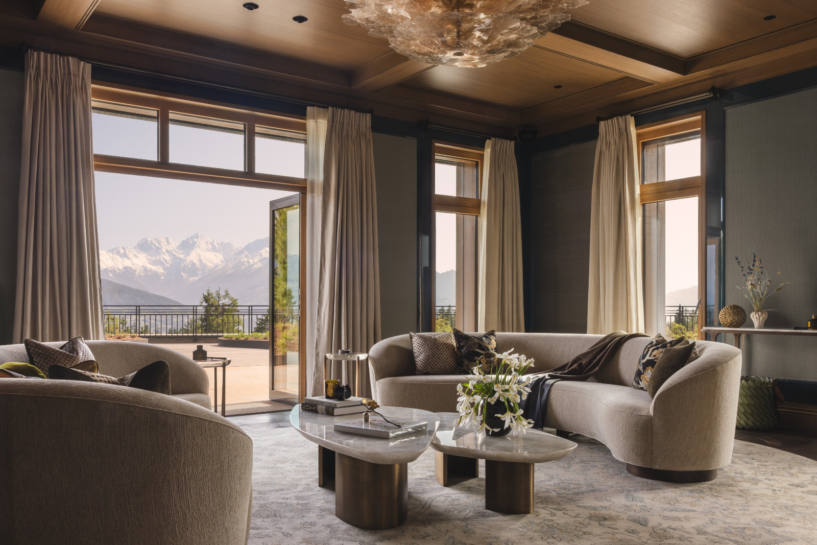 The living room in a multigenerational family chalet in the Swiss Alps designed by Portia Fox Interiors