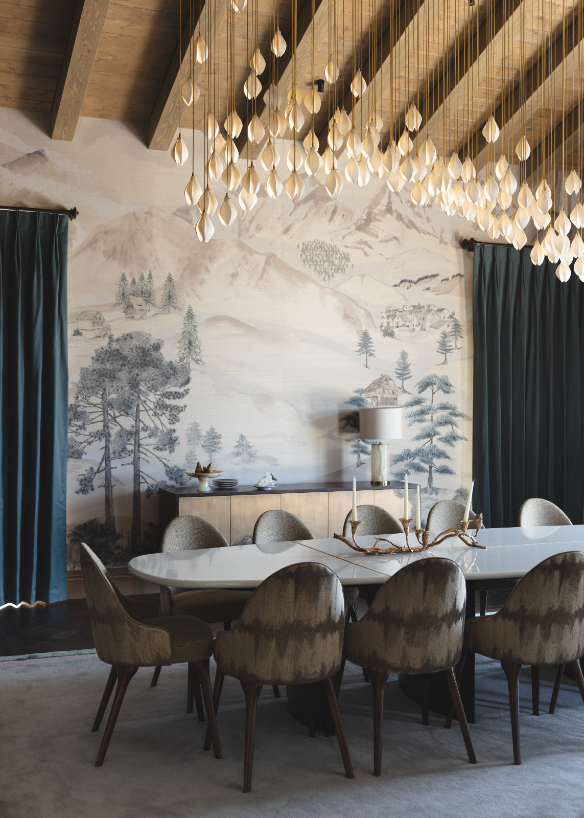 The dining room in a multigenerational family chalet in the Swiss Alps designed by Portia Fox Interiors