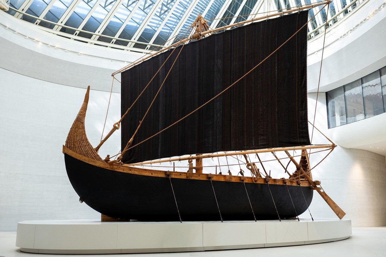 A reconstructed Arabian sailing vessel on display within one of the museum's six permanent galleries, housed beneath a glazed oculus