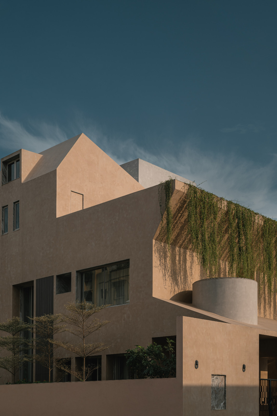 An emphasis on materiality and architectural forms in a Navsari, India family home designed by Veeram Shah of Design Ni Dukaan