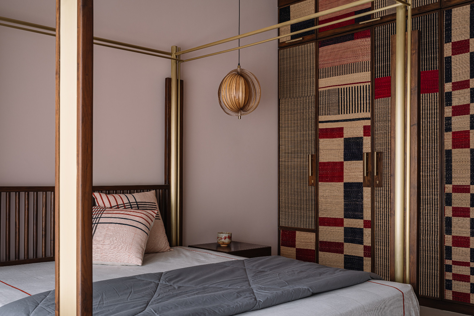 The bedroom in a Navsari, India family home designed by Veeram Shah of Design Ni Dukaan
