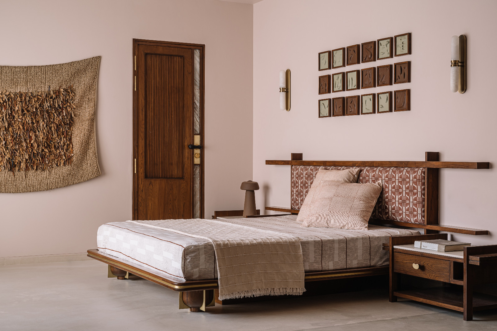 The primary bedroom in a Navsari, India family home designed by Veeram Shah of Design Ni Dukaan