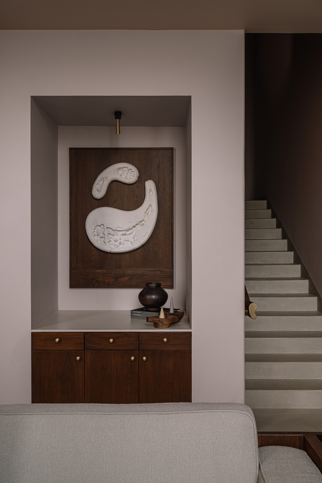 The stairway in a family home in Navsari, India designed by Veeram Shah of Design Ni Dukaan