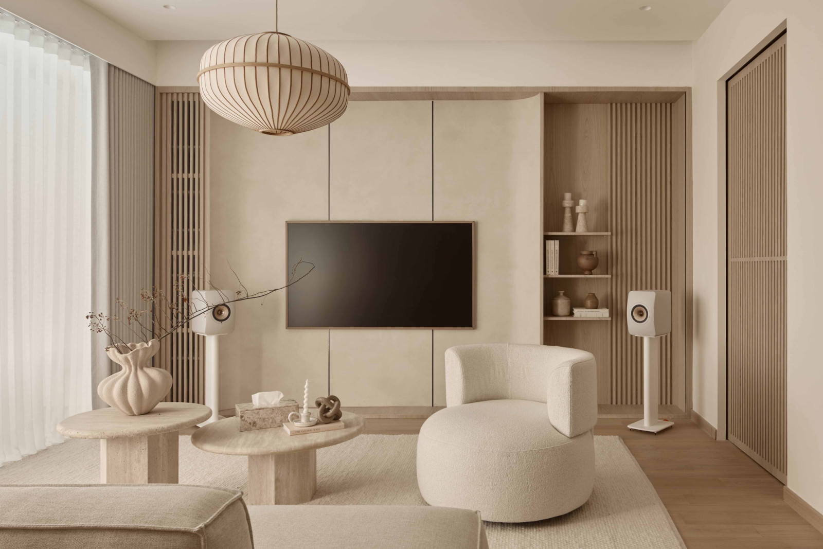 Light woods add warmth, consistent finishes keep things cohesive, and soft whites and beiges make the home easy to live in