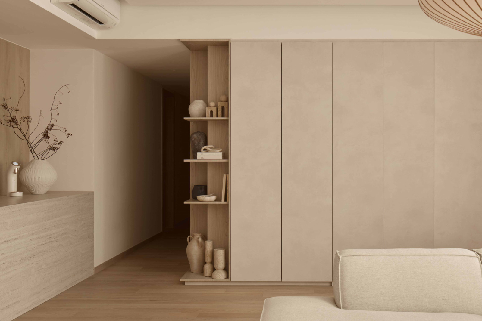 Concealed, intuitive storage was designed around daily routines, keeping the home ordered without feeling rigid