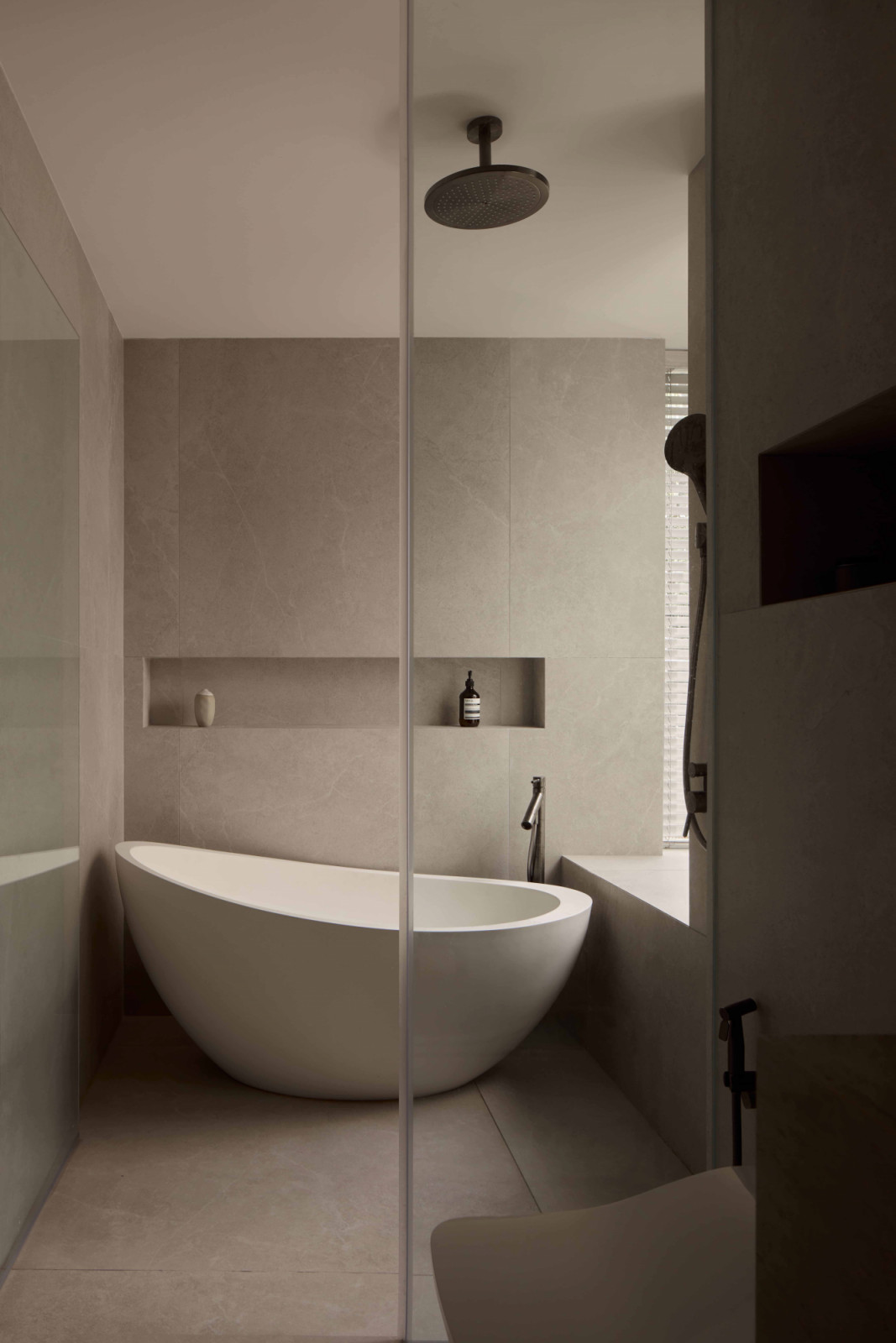 A spa-like bathroom lets the homeowner feel like they’re perpetually on holiday
