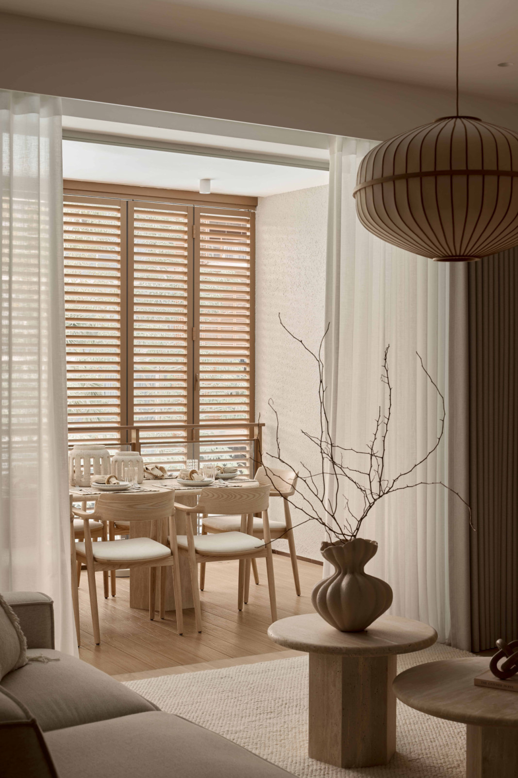The dining area is sunlit and kept light for an open and relaxed feel