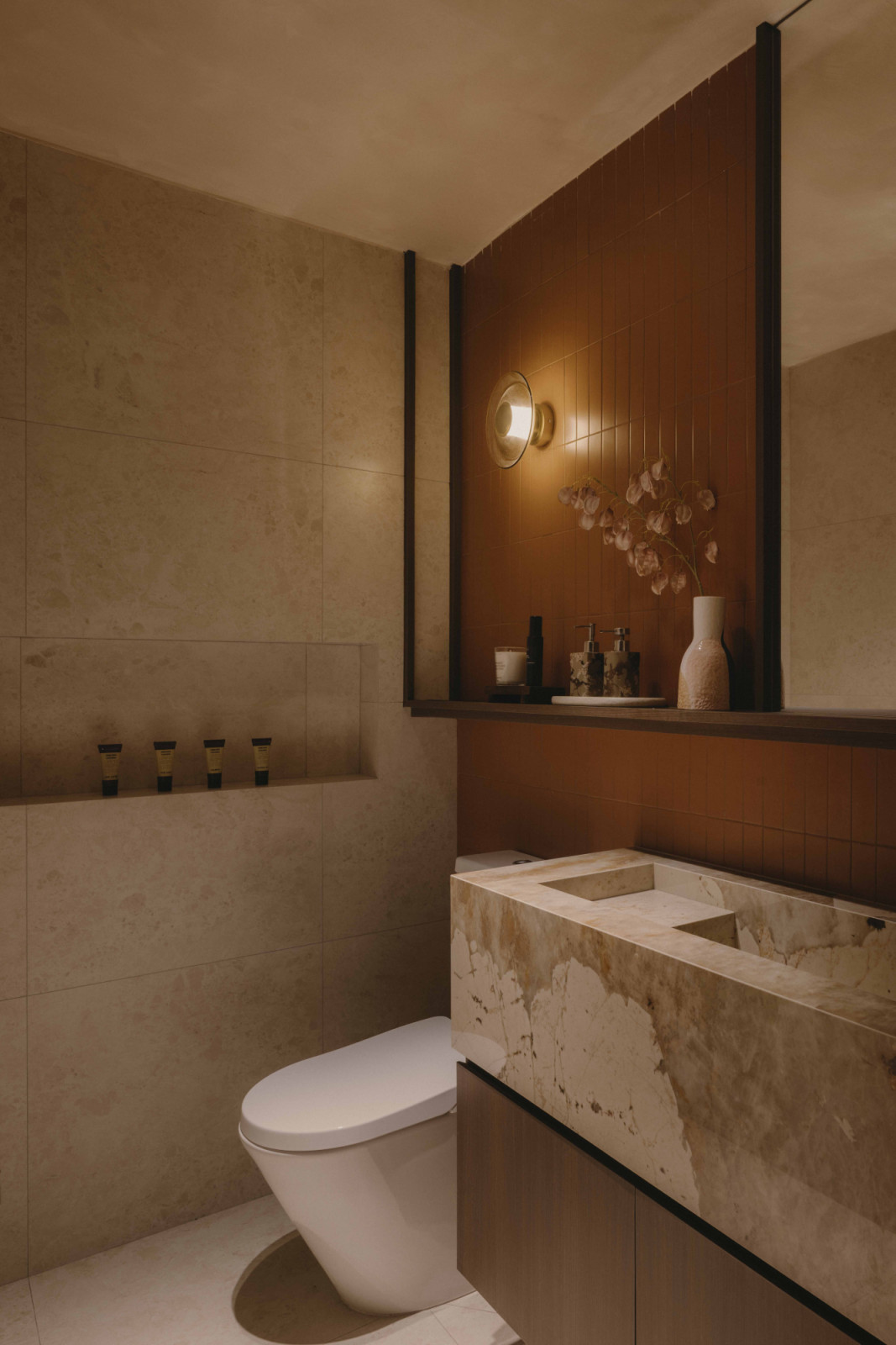 The bathroom, like the rest of the space, feels homey and calm
