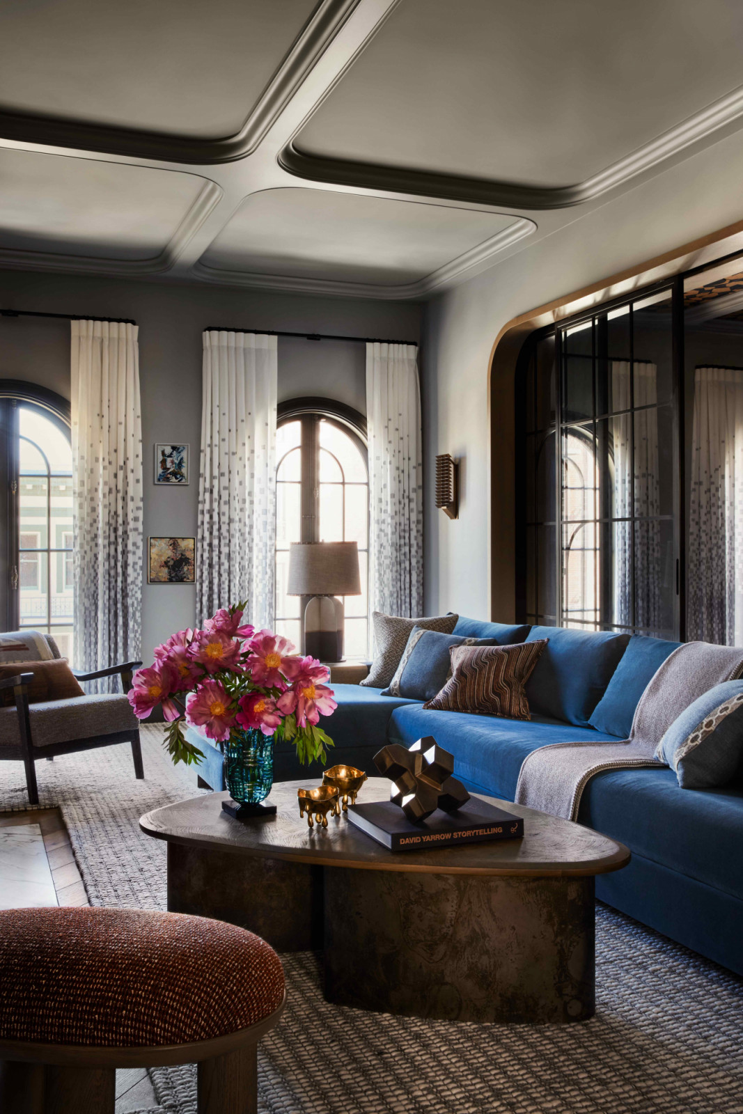 The living room with the client’s favoured blues and greys