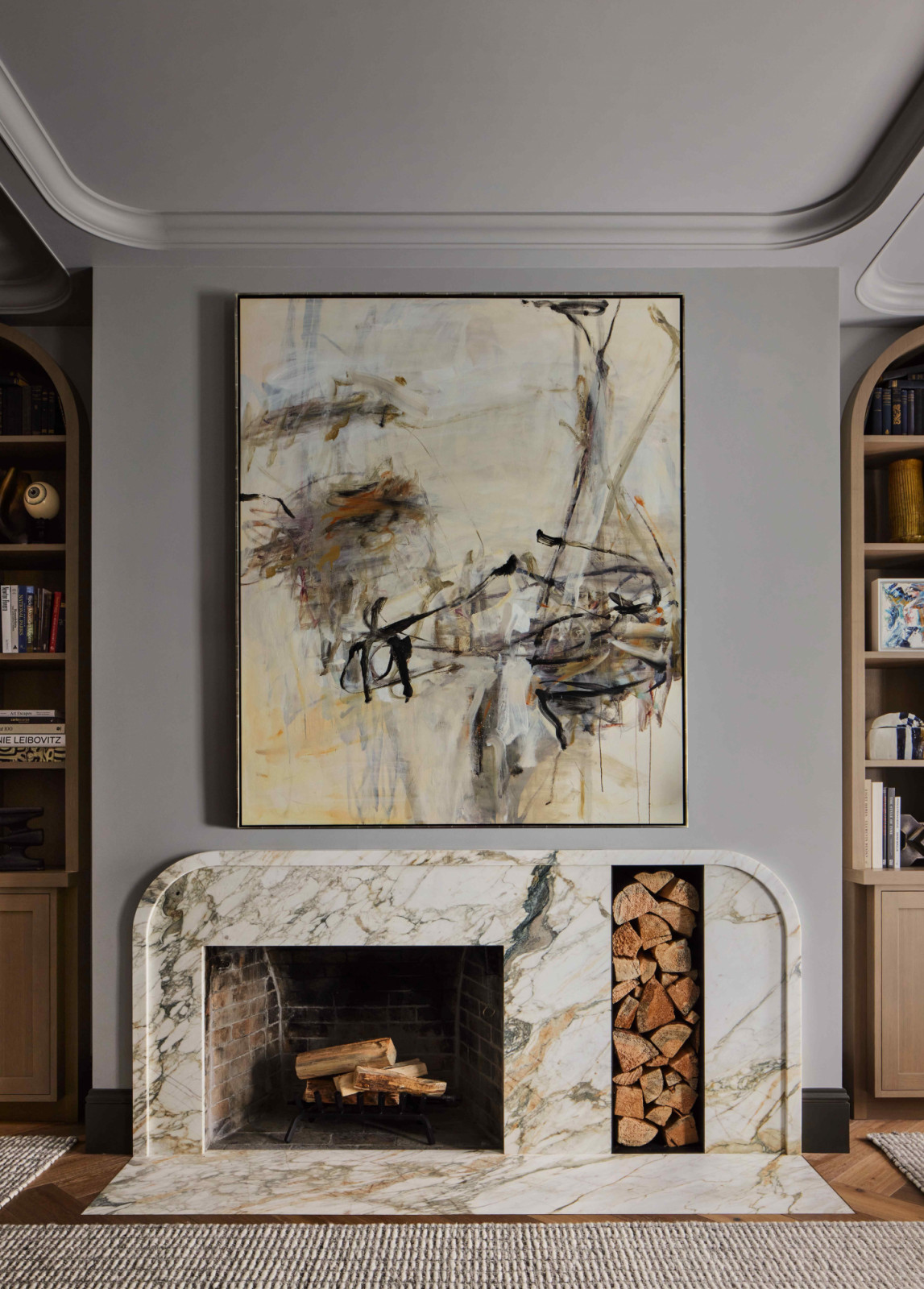 The original wood-burning fireplace, updated to comply with present-day health and safety codes