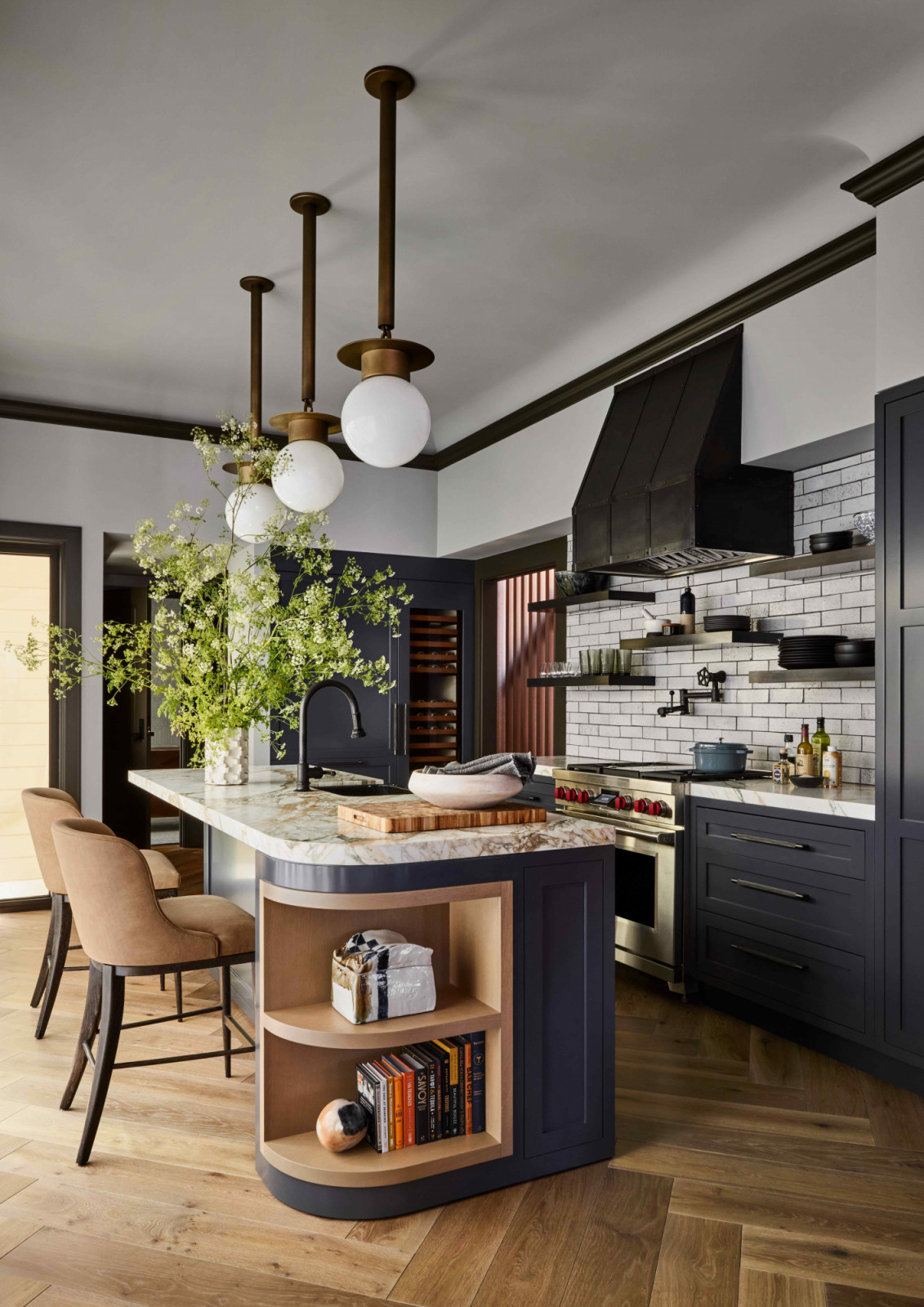 The kitchen area with natural oak used throughout the cabinetry
