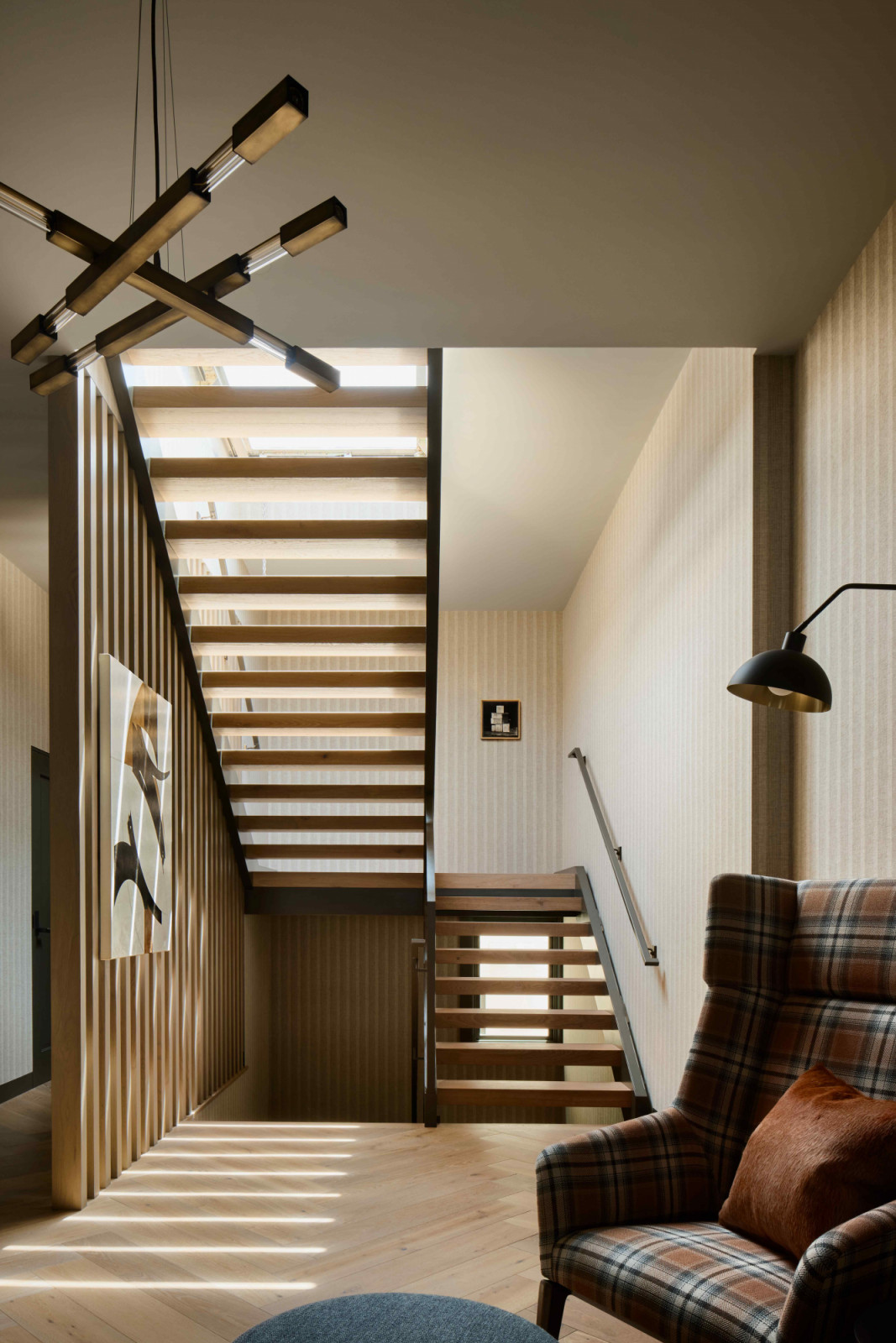 The newly introduced stairway leads to a large operable skylight