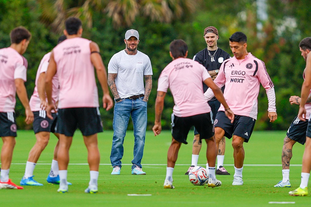 David Beckham observing Inter Miami players at practice.