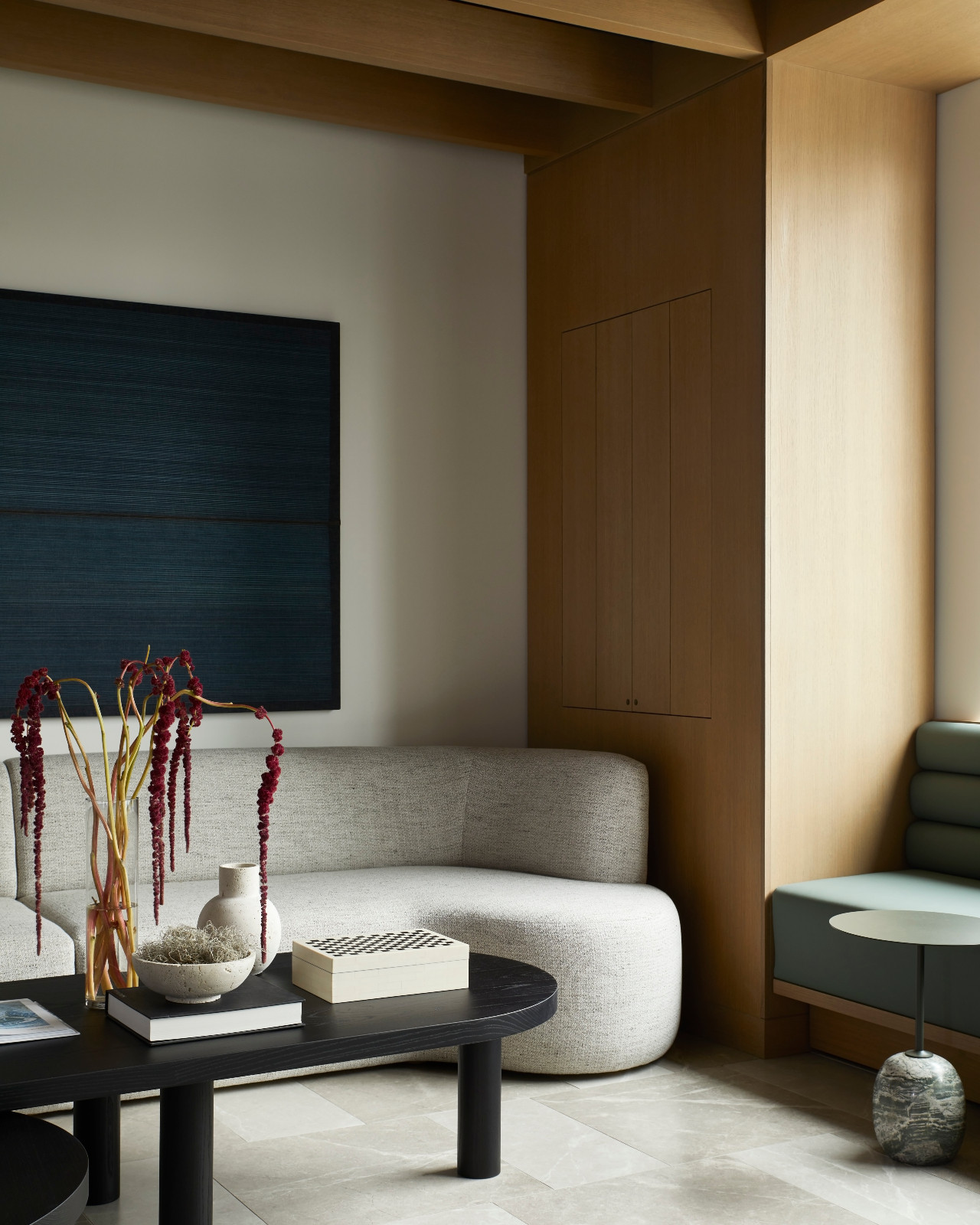 Balancing a need for serenity and seamless communication among colleagues, this Ontario, Canada office by Studio HA/WA creates a refined lounge atmosphere