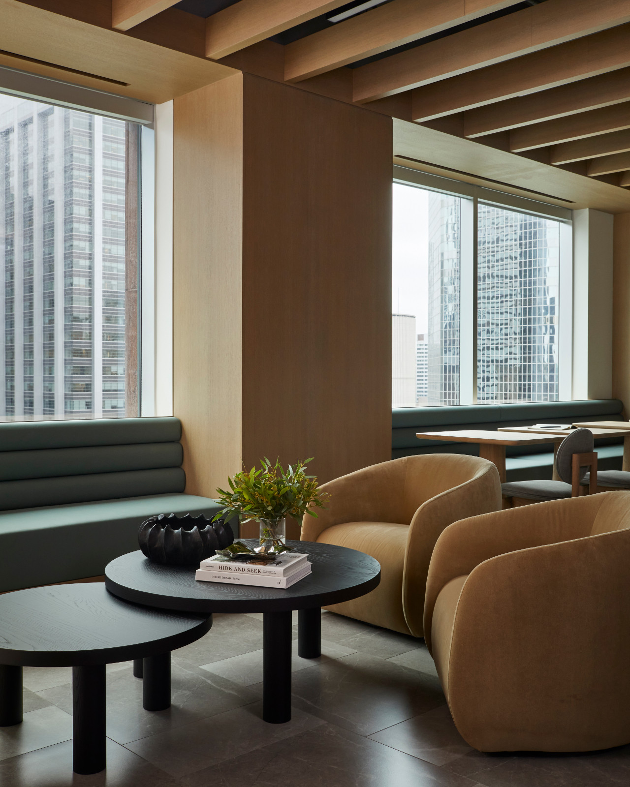 Balancing a need for serenity and seamless communication among colleagues, this Ontario, Canada office by Studio HA/WA creates a refined lounge atmosphere
