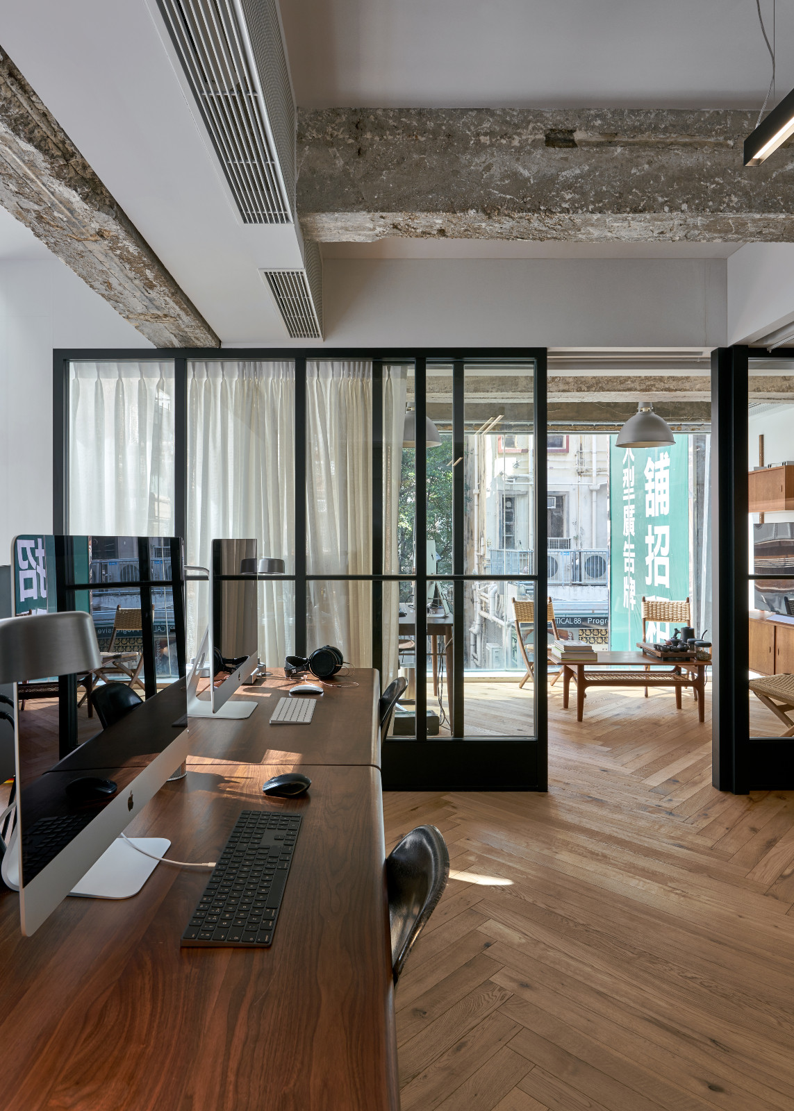The elegant interior of Analogue, a Hong Kong office designed by JJ Acuña bespoke