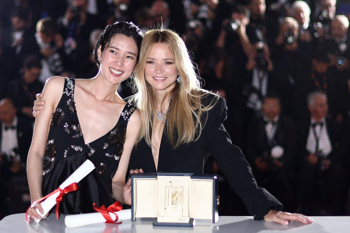 Virginie Efira and Tao Okamoto, Best Actress award co-winners for their roles in the film "Soudain" (All of a Sudden), pose during a photocall after the closing ceremony of the 79th Cannes Film Festival in Cannes, France, May 23, 2026. REUTERS/Gonzalo Fuentes TPX IMAGES OF THE DAY