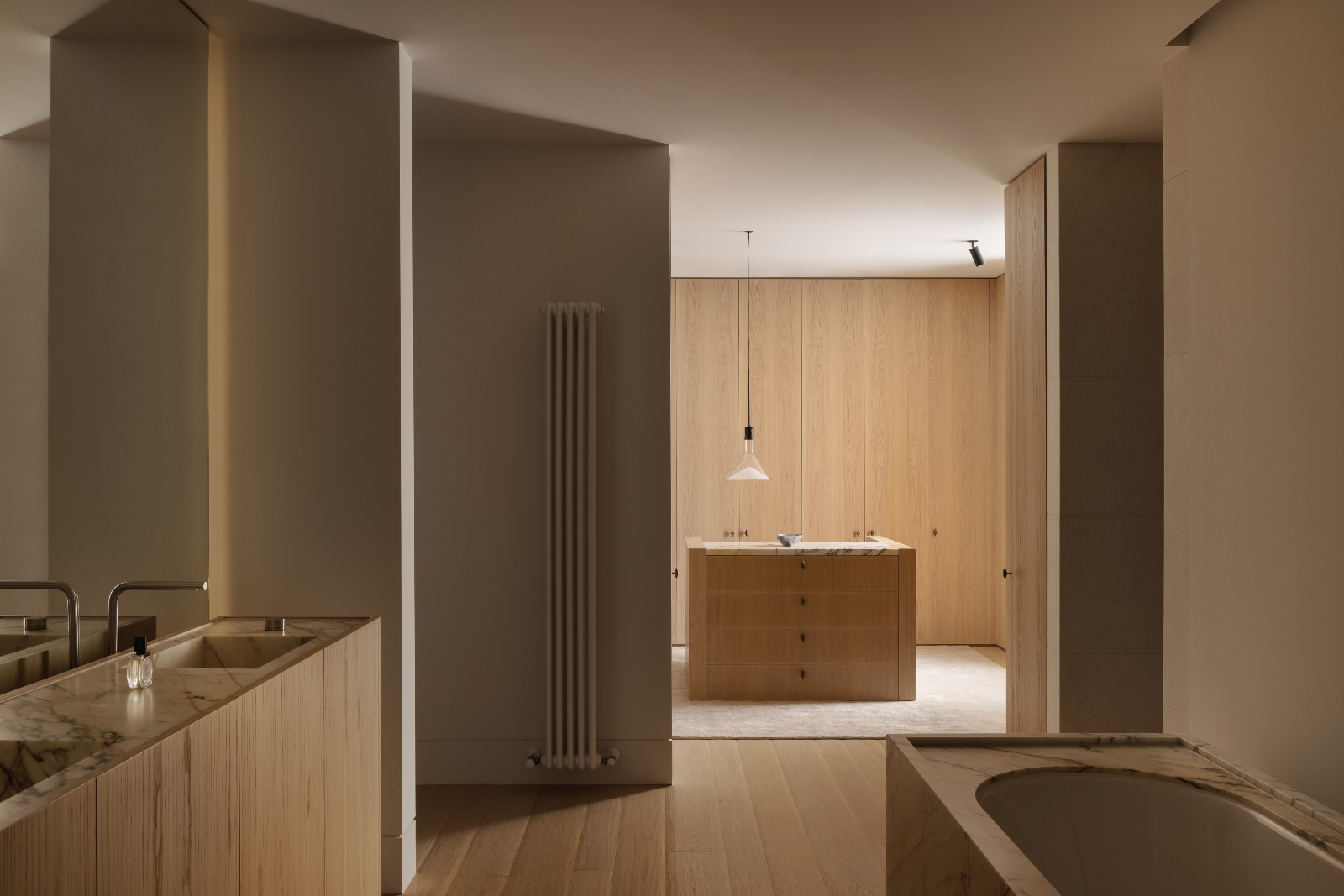 The primary bathroom and walk-in closet of architect Paul Conrad's home in the suburbs of Melbourne, Australia