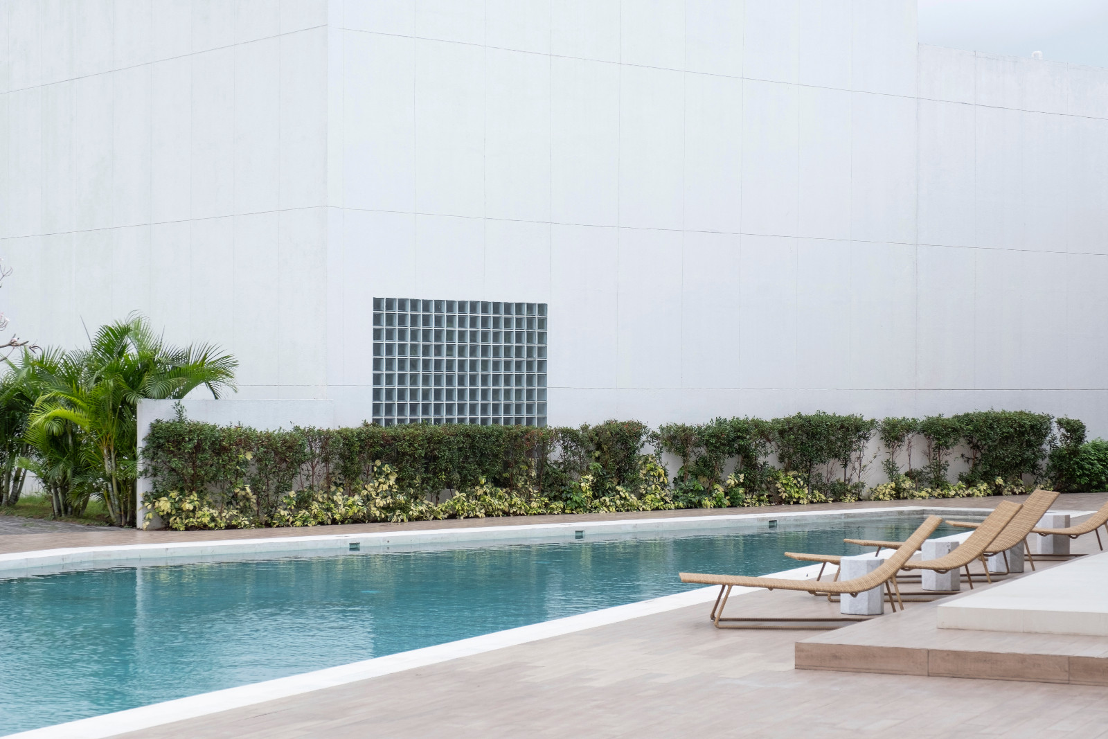 A minimalist landscape around this pool, reflecting Lim’s attentiveness to client preferences