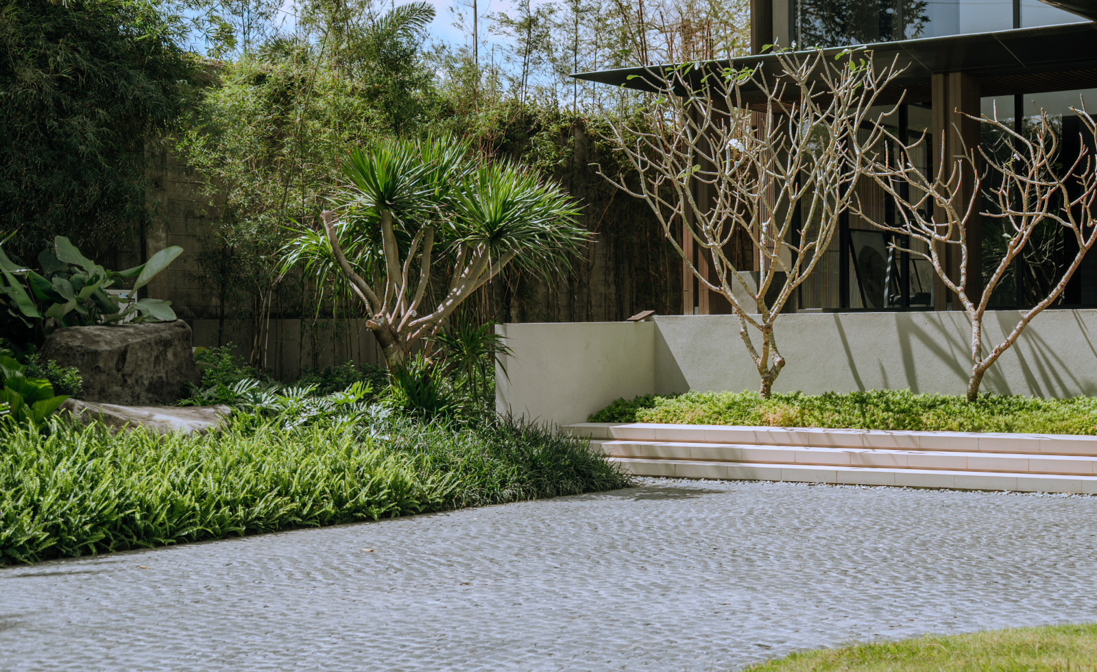 This driveway exemplifies harmony between nature and stone