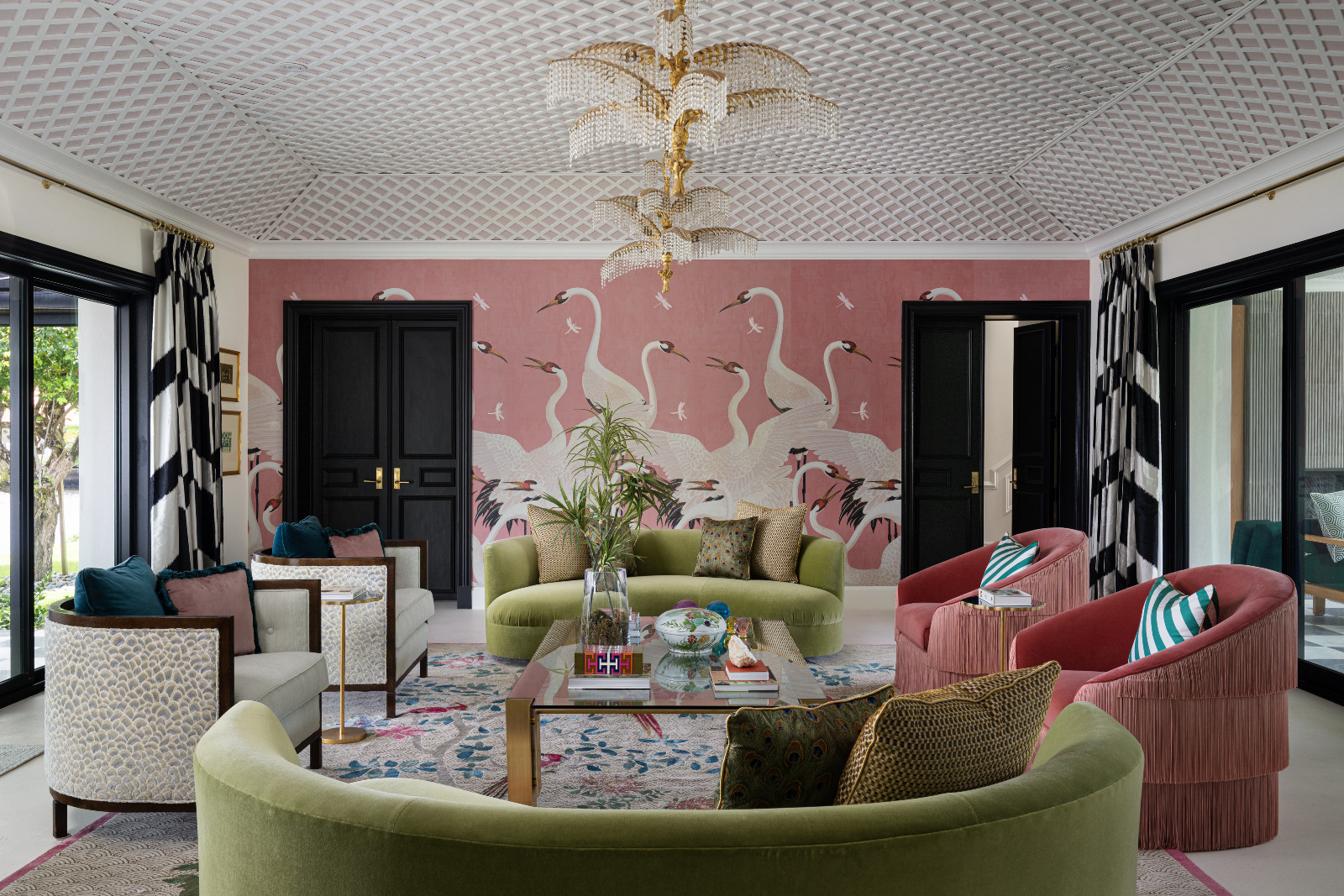 The unexpected colour combination draws the eye into the living room of a maximalist, eclectic Florida home designed by Mr Alex Tate
