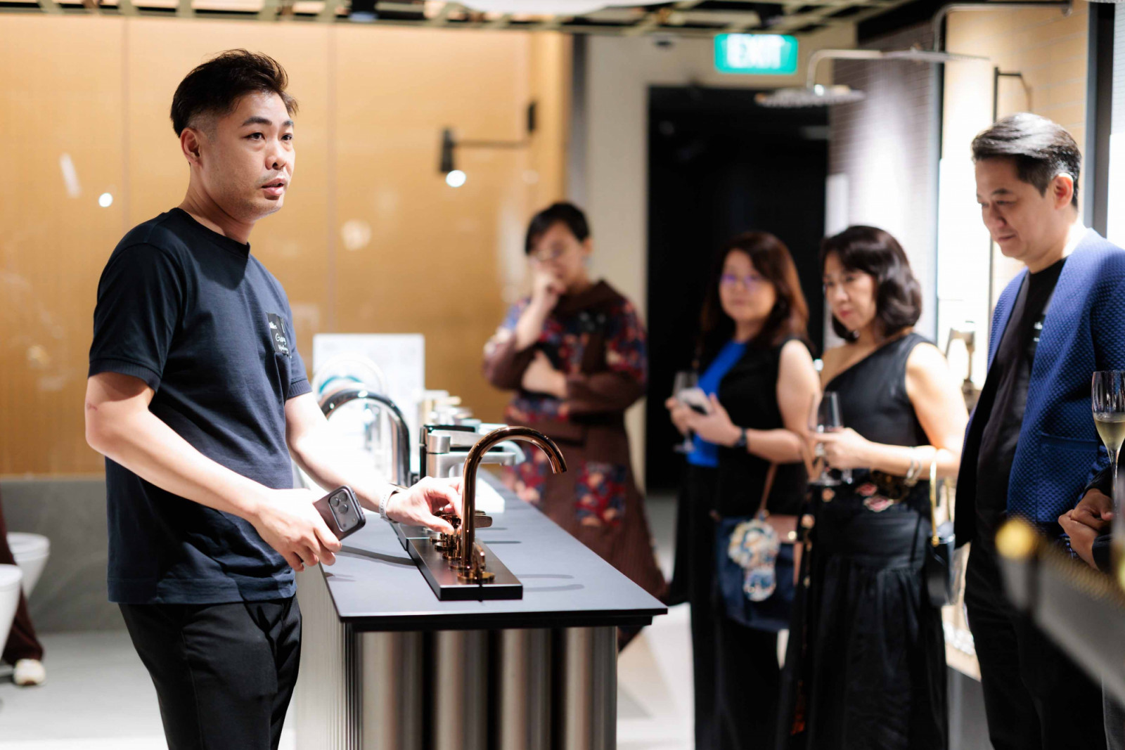 Hafary Bathroom’s Gary Tan introducing guests to Zuchetti’s bathroom fittings