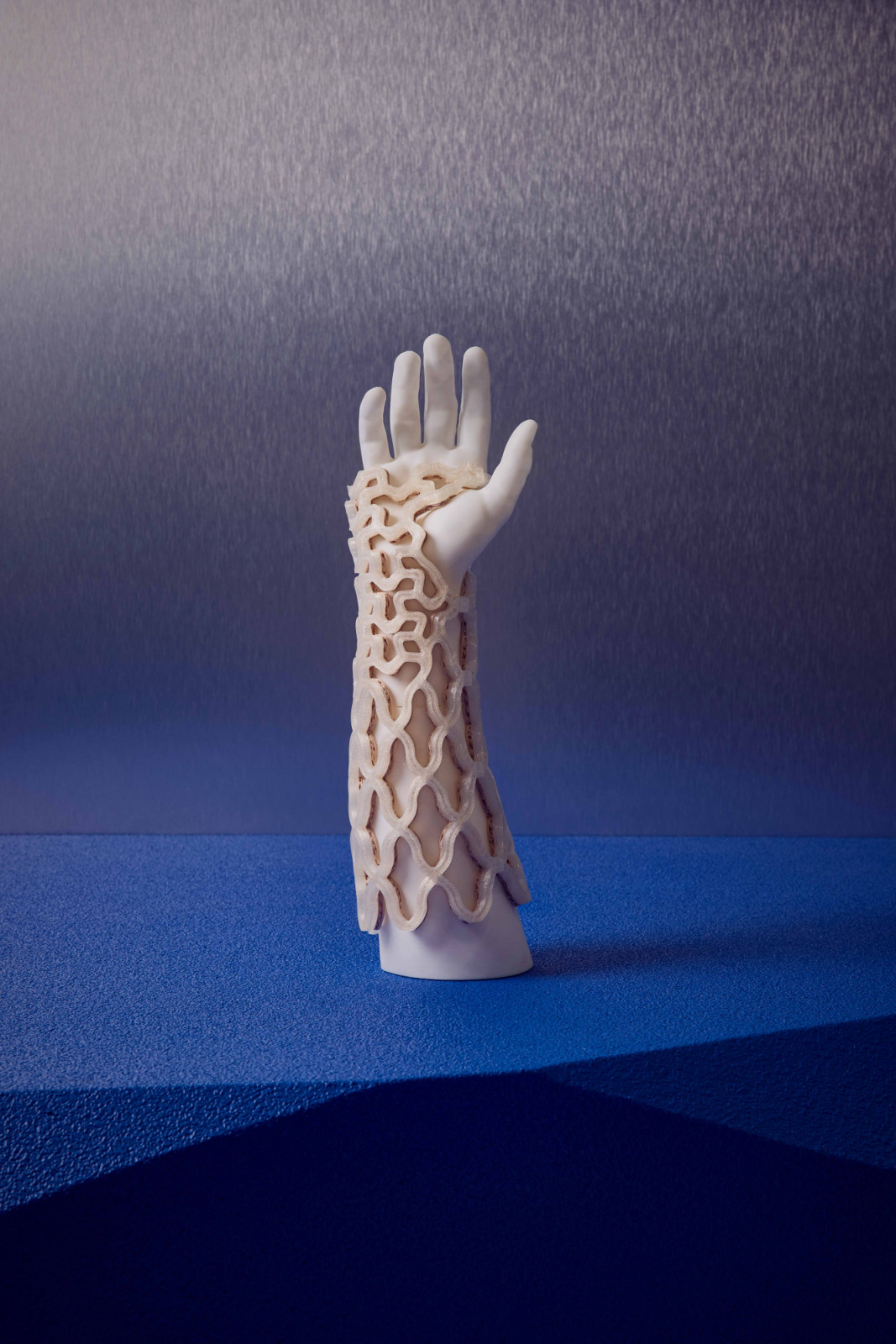 TessaCast: a 4D-printed orthopaedic cast that is lightweight, breathable and reusable