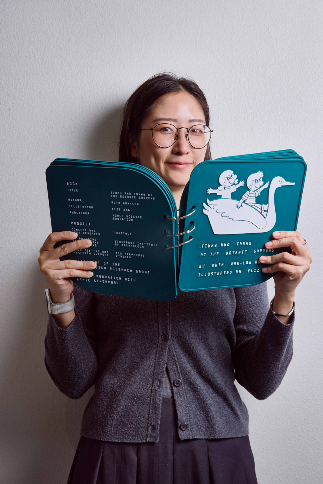 Foler Goh of Tusitala with 3D-printed tactile picture book