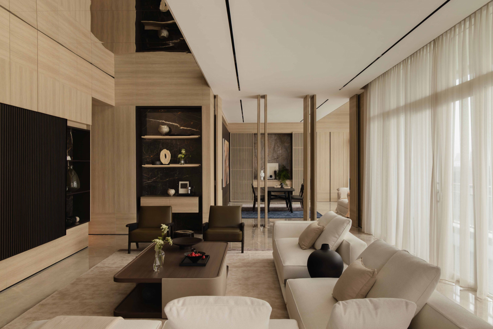 With the operable doors open, the study extends the living room sightlines to create a generous, fluid common area