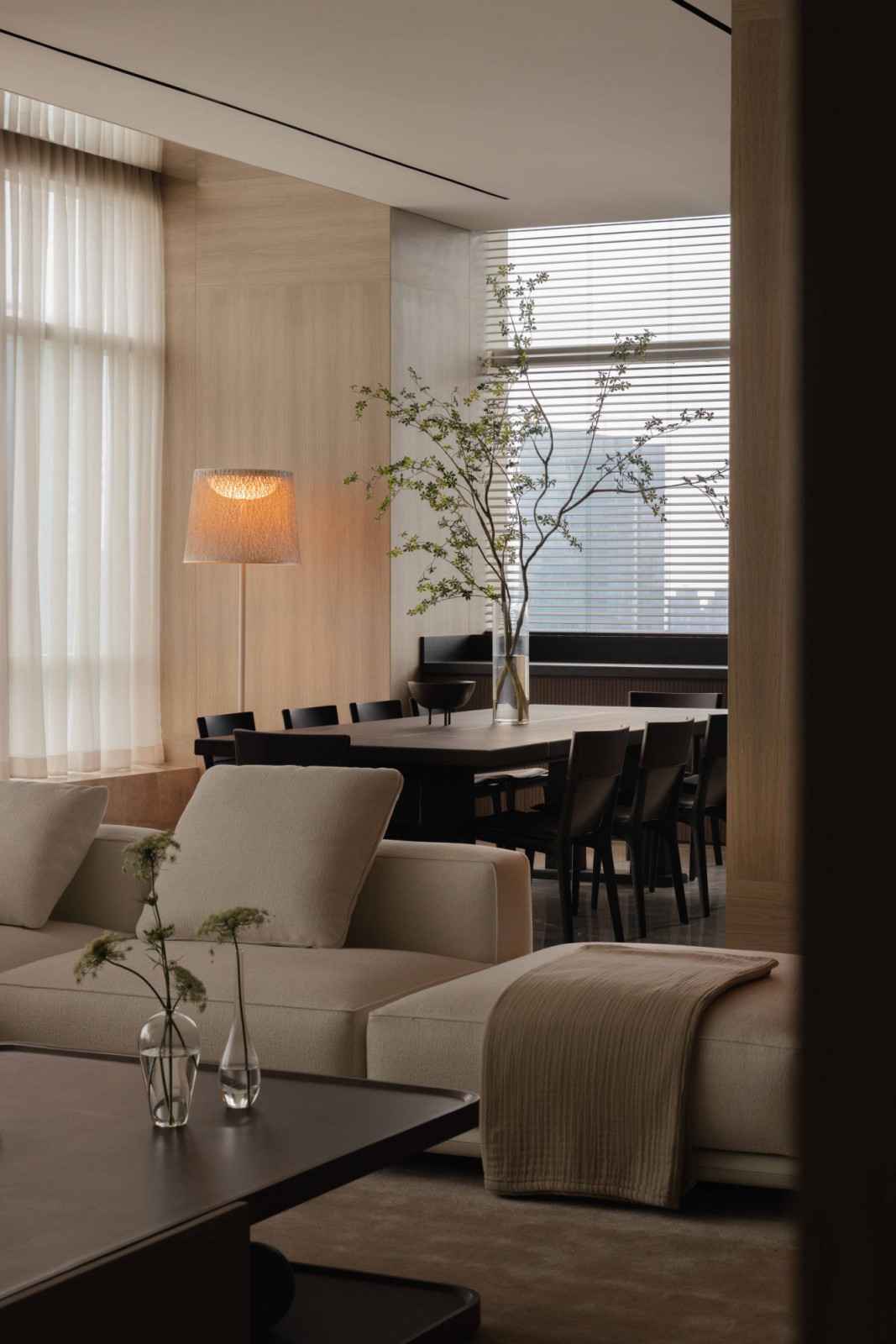 The living and dining areas flow together as one generous, light-filled space