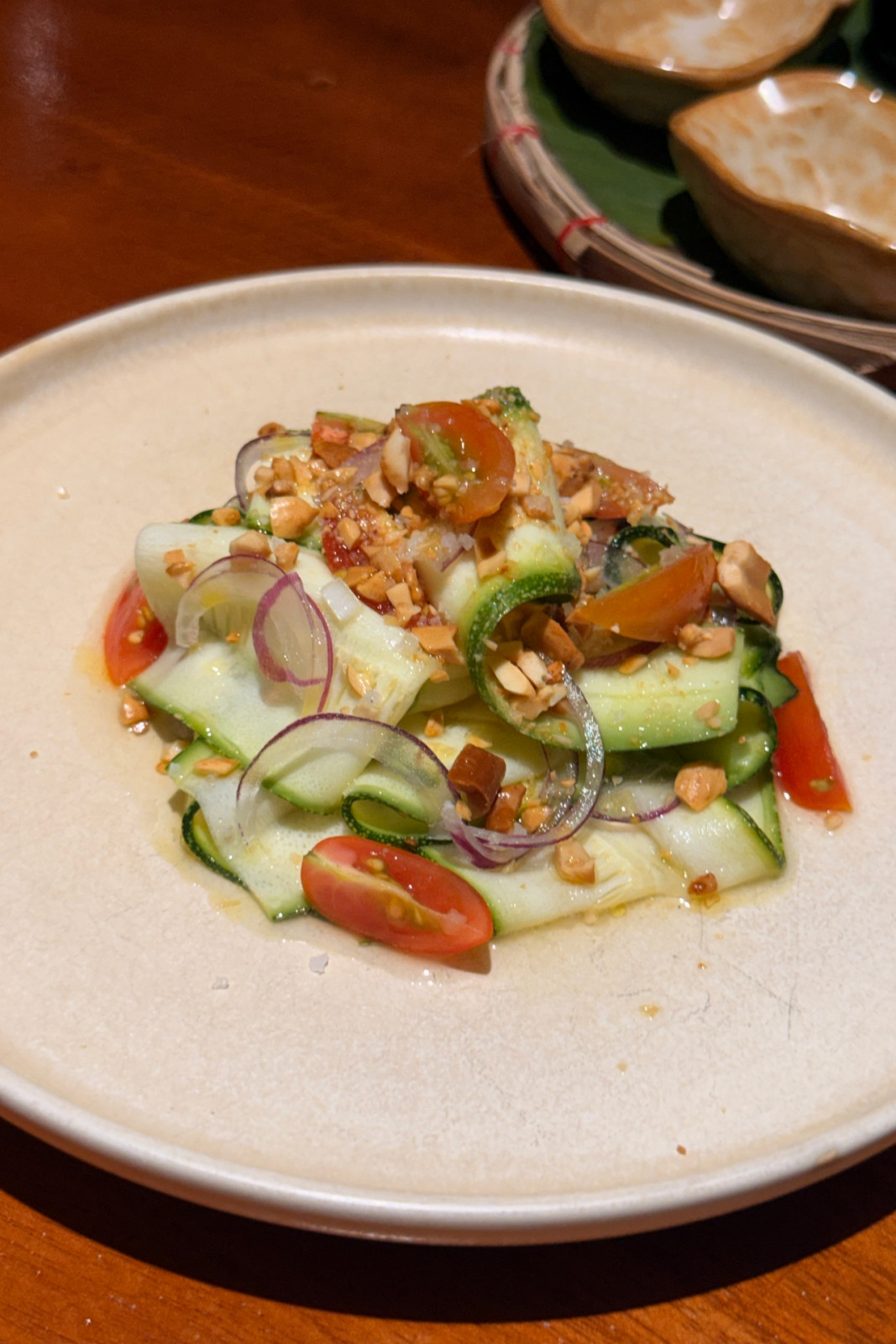 Grilled eggplant and ensaladang zucchini with cream cheese, calamansi and peanuts from Toma Toma