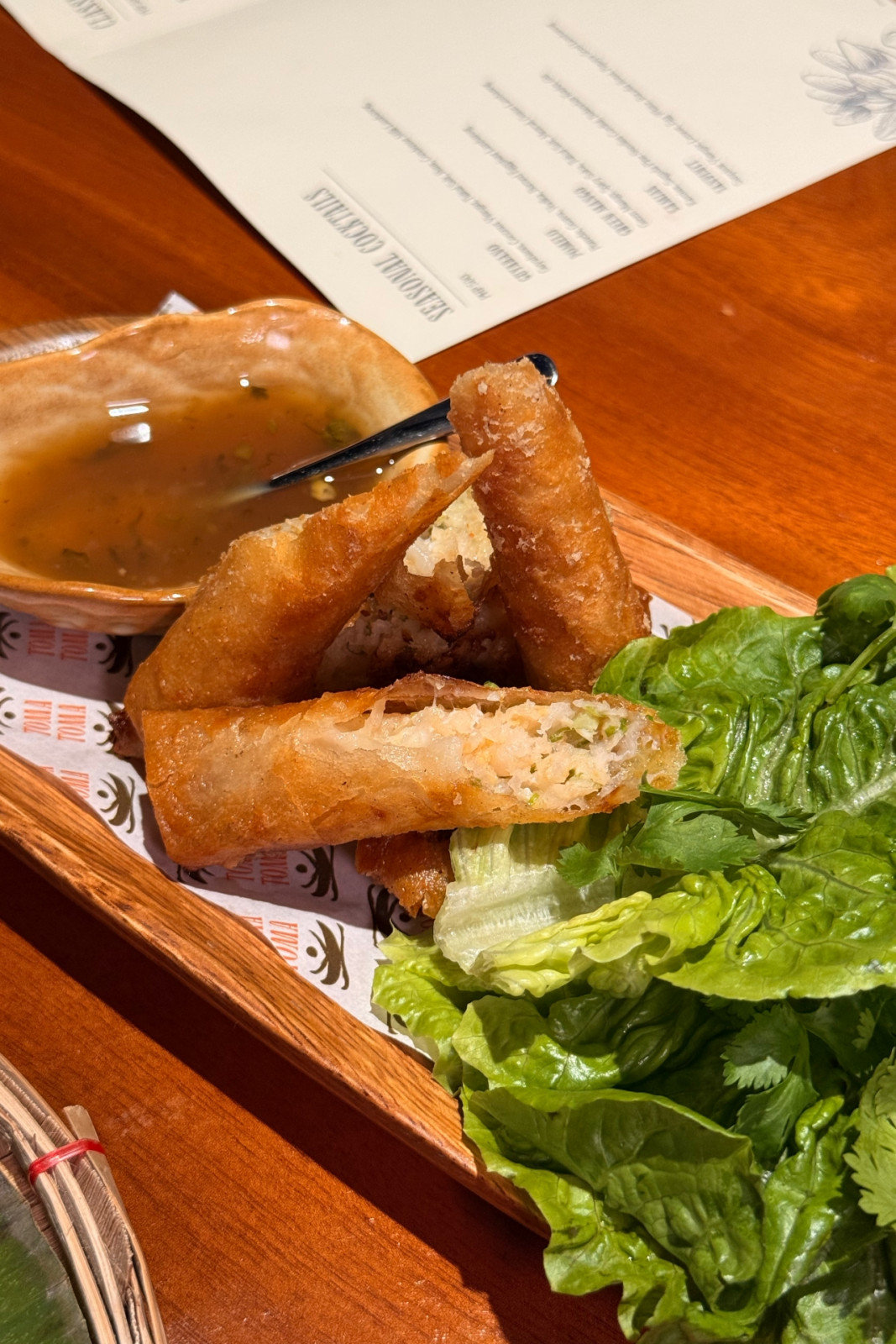 Prawn lumpia with patis calamansi dressing at Toma Toma