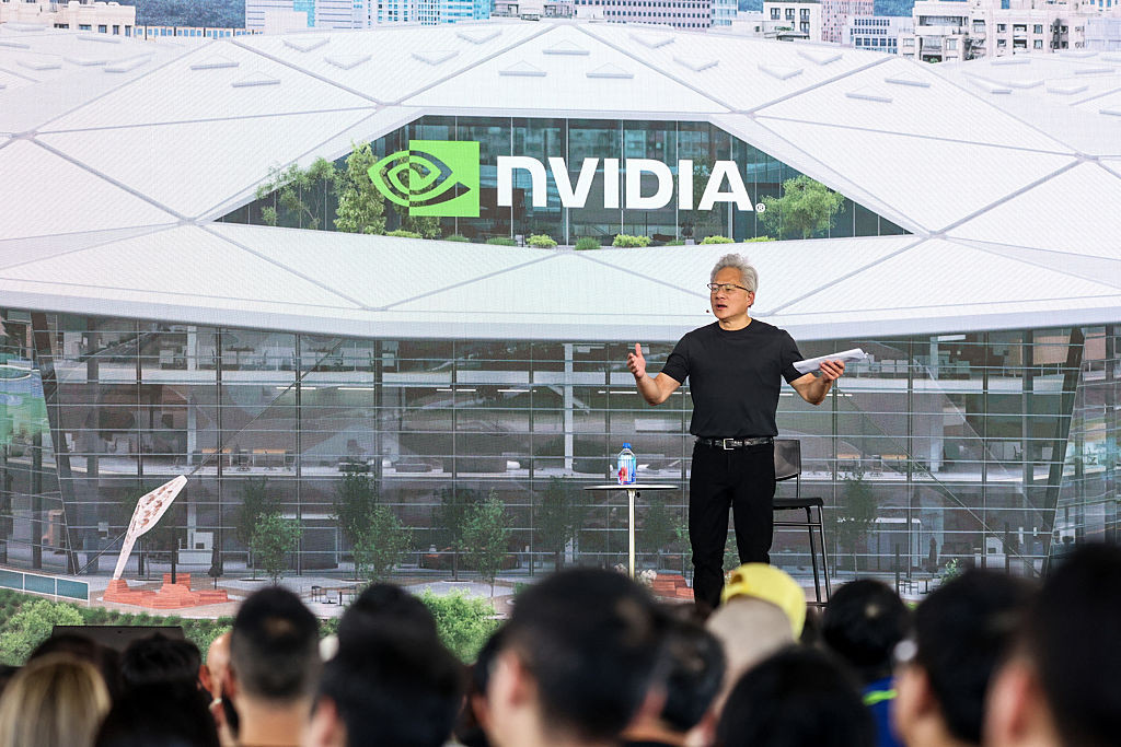 Nvidia CEO Jensen Huang speaks at the company-wide convention at their T17 and T18 plots in Shilin-Beitou Technology Park in Taipei on May 27, 2026. (Photo by I-Hwa Cheng / AFP via Getty Images)