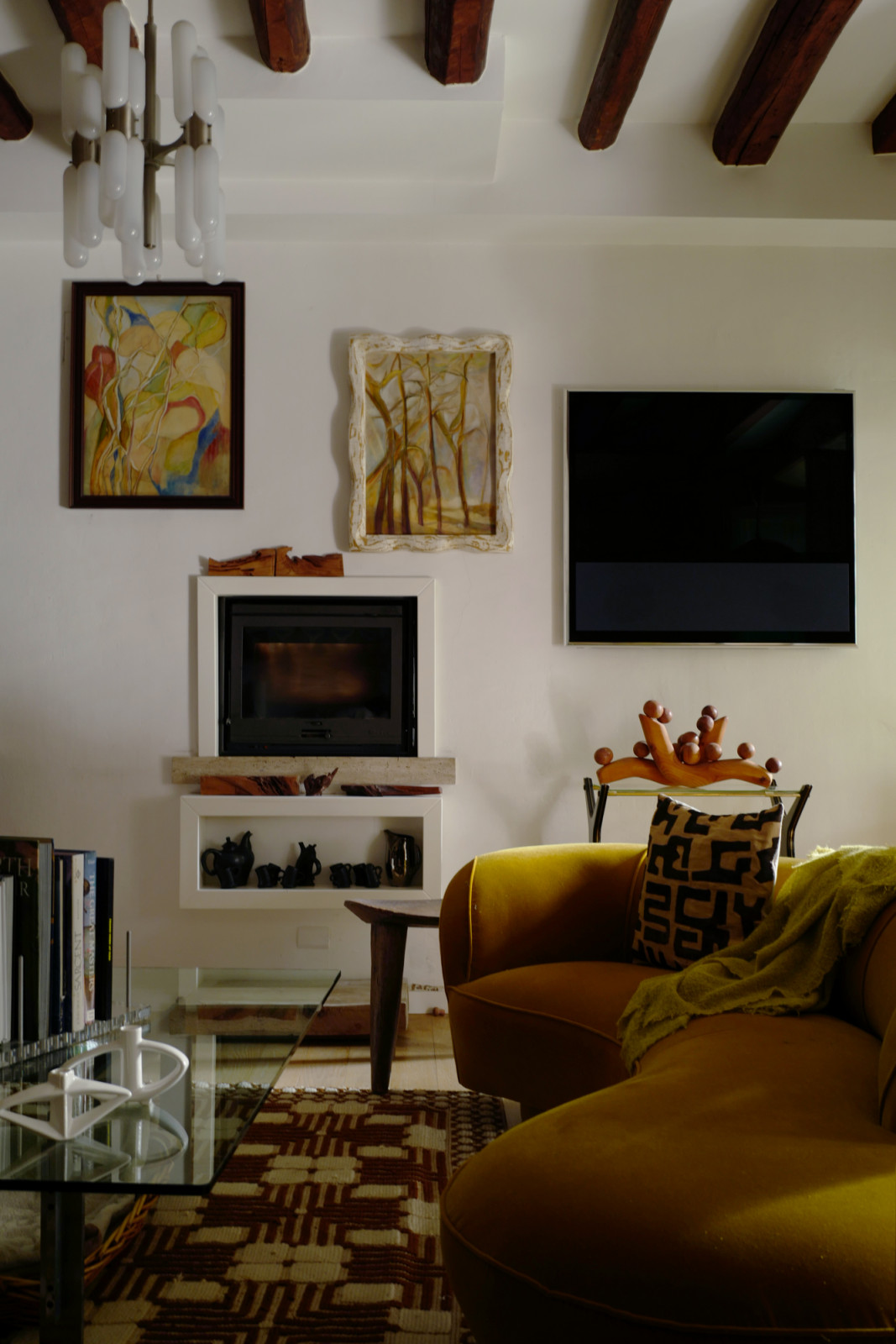 The living room walls are lined with artworks collected from friends, teachers and artists close to Hailye’s life, reflecting a home shaped by relationships as much as aesthetics