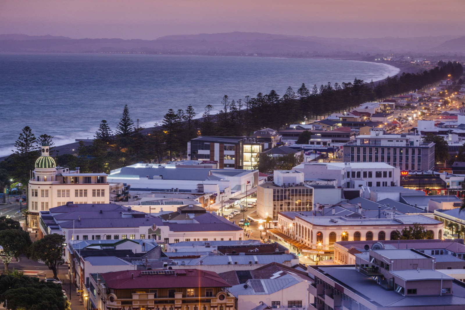 New Zealand, North Island, Hawkes Bay, Napier, elevated city view, dusk (Photo: Walter Bibikow / Getty Images)