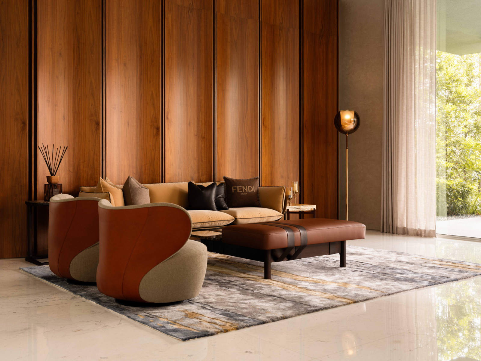 The informal living area’s existing full-height scalloped timber feature wall forms a rich, warm backdrop to the Fendi Casa sofa set
