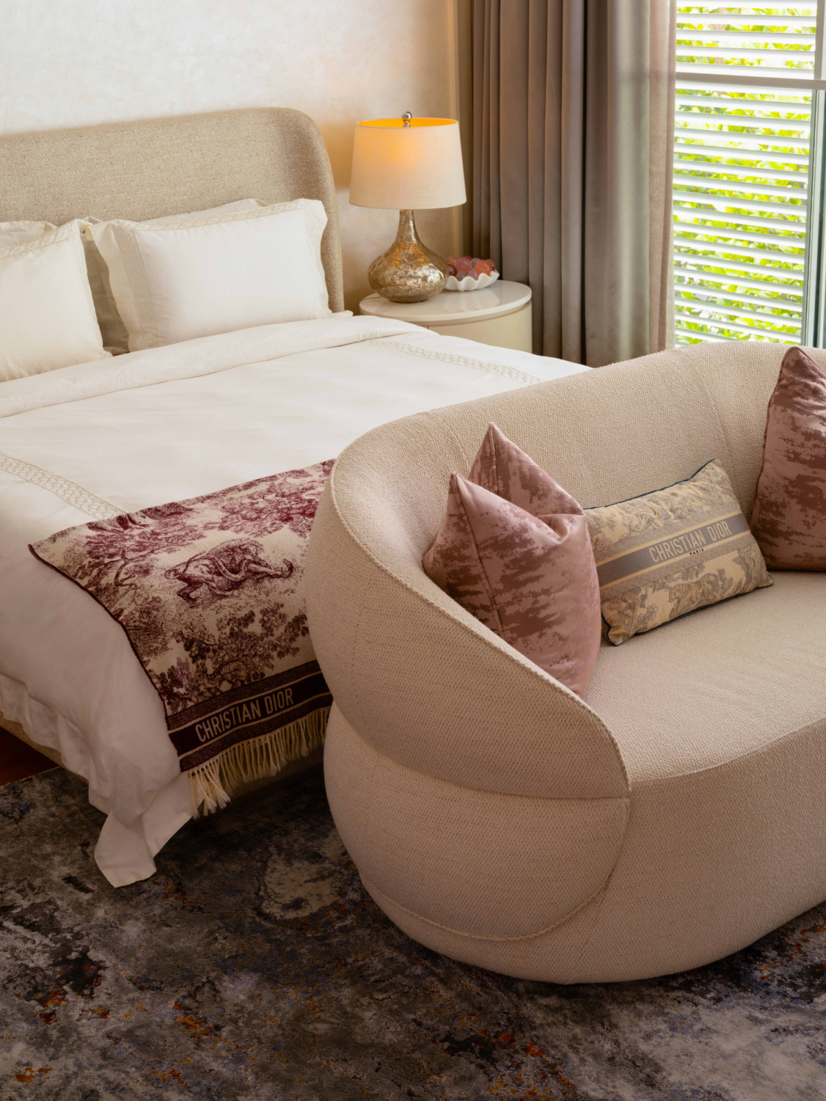 Christian Dior accents, from the toile de jouy bed runner to the cushions, give the daughter's bedroom its unmistakably personal character