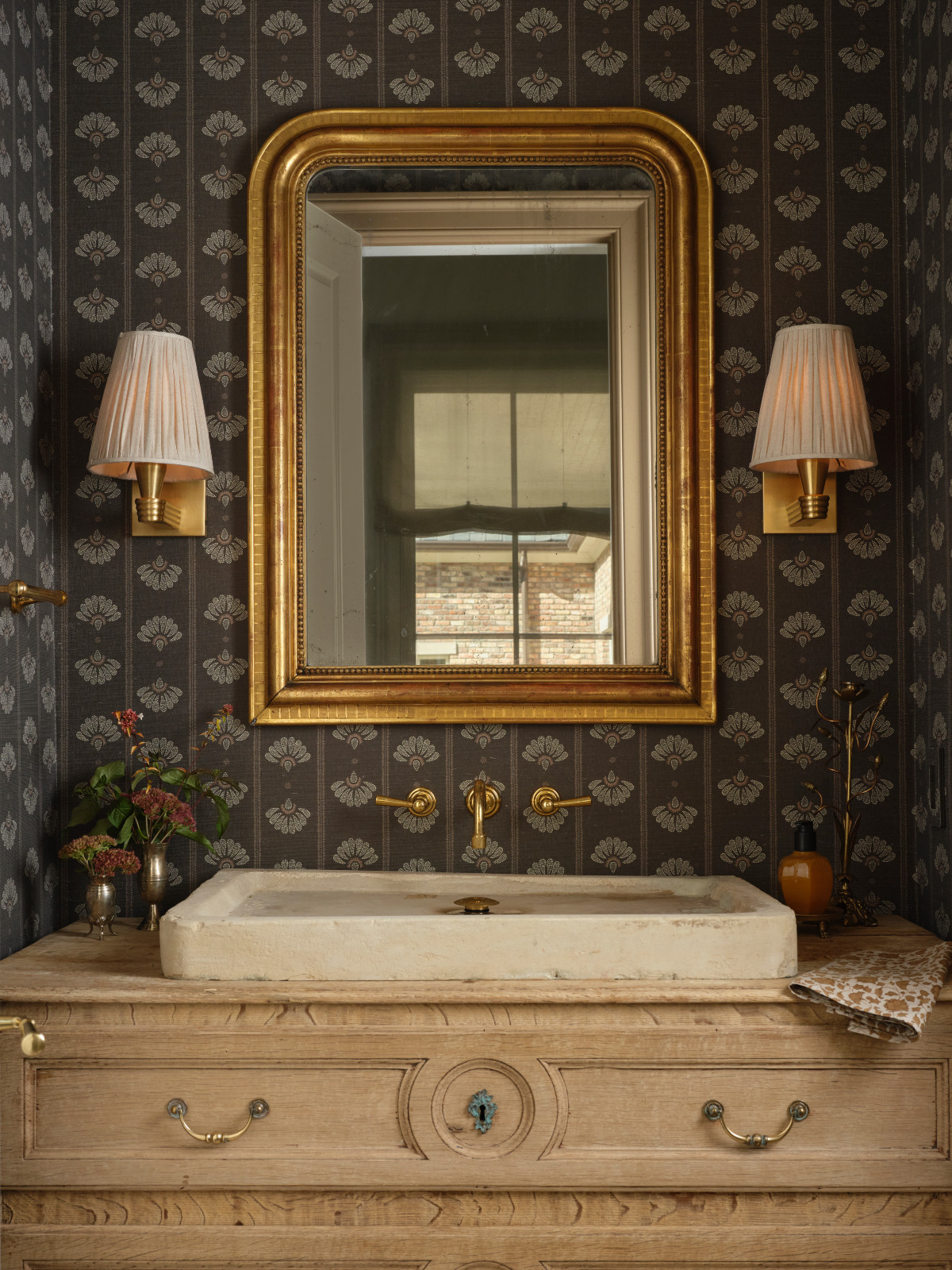 The powder room of a Mississippi home by Claire Thompson Design