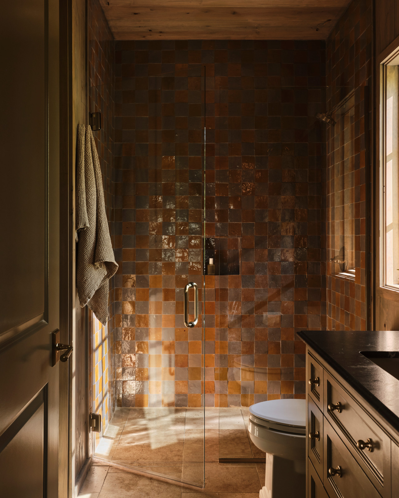 The bathroom of a Mississippi home by Claire Thompson Design