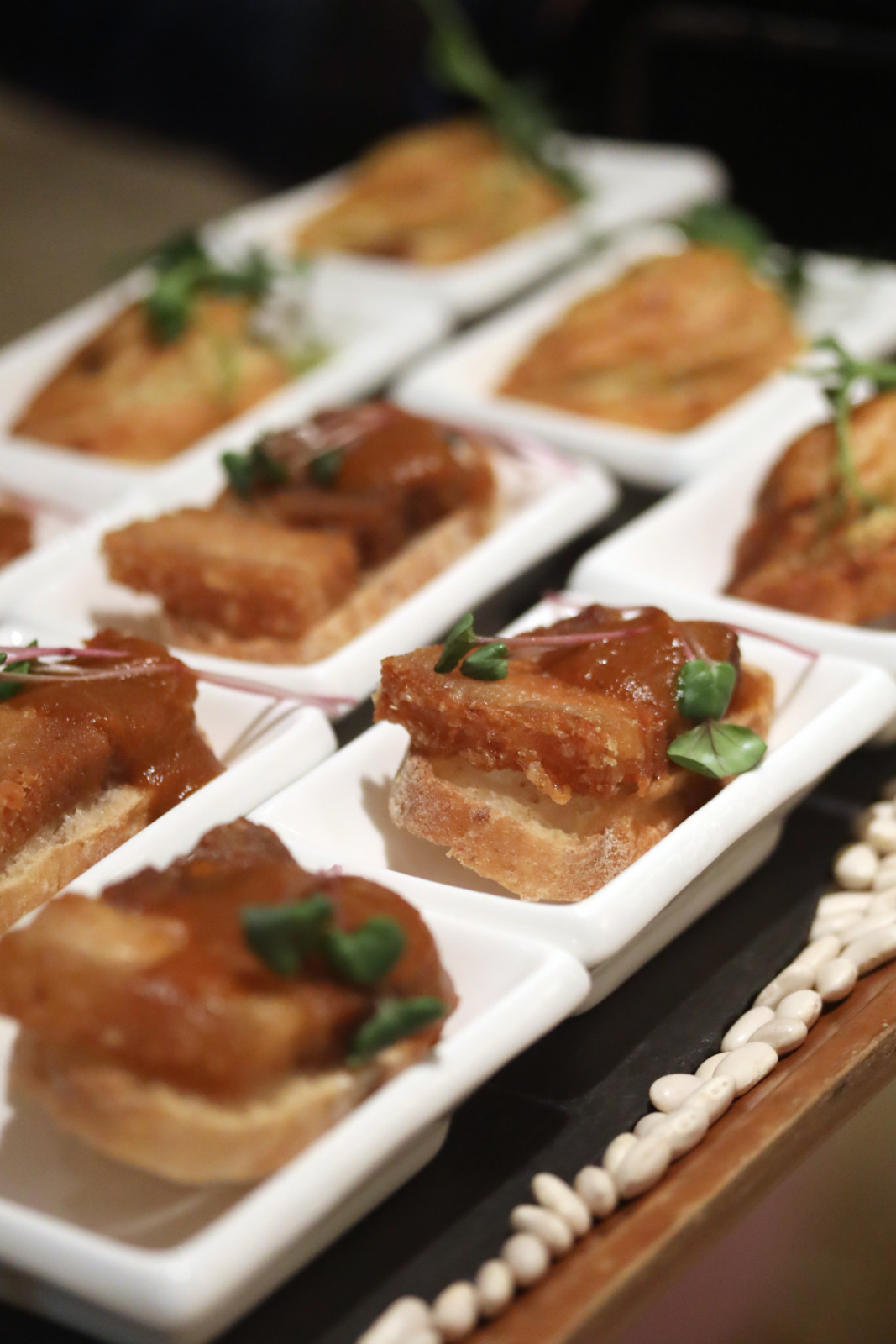 A curated spread of canapés accompanied the evening's opening reception.