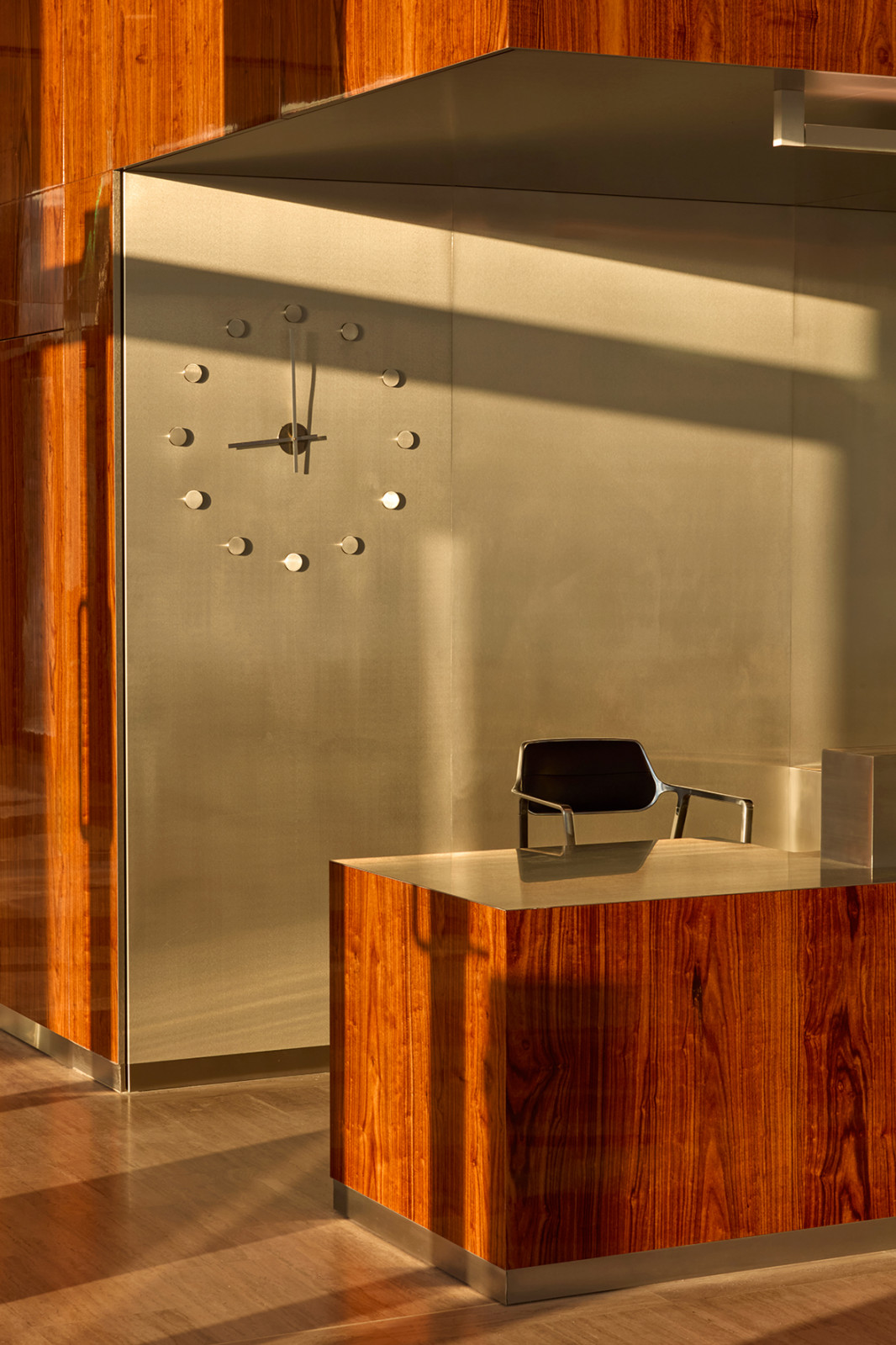 Reflecting 1970s charm with a blend of wood and metal, Biehler Graveleine reimagines the office lobby as a place of connection and dynamic movement