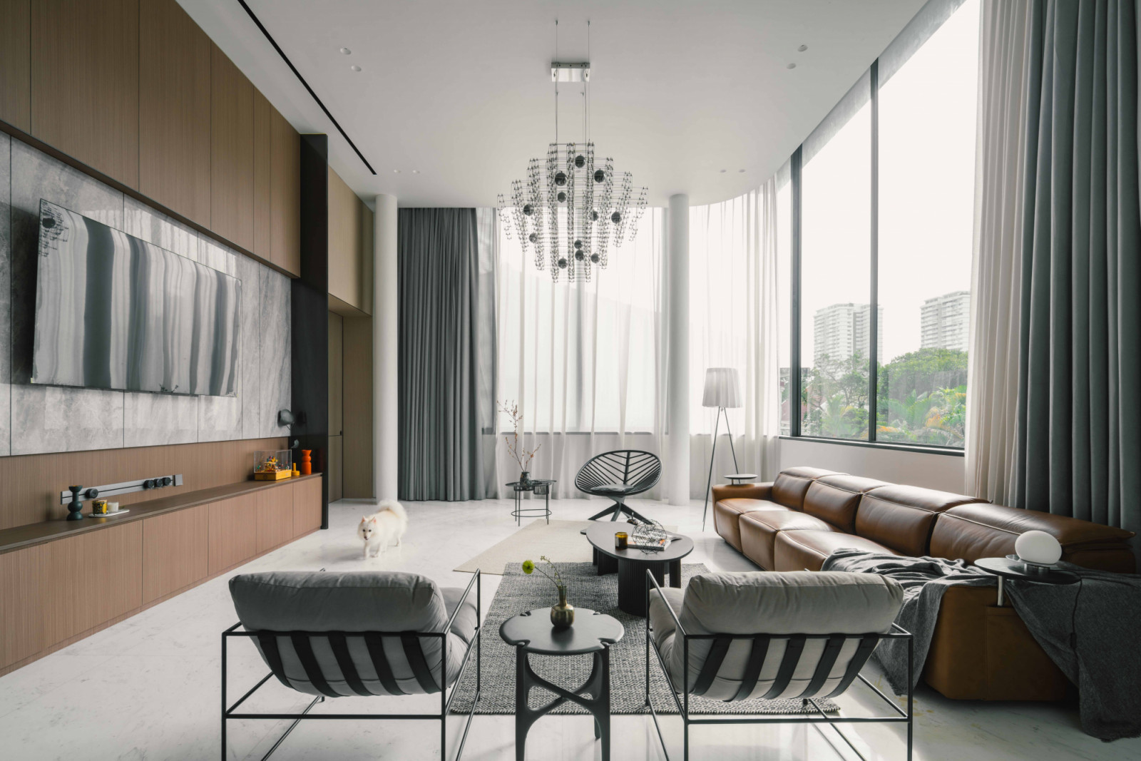 The house looks out to verdant views of the nearby nature reserve