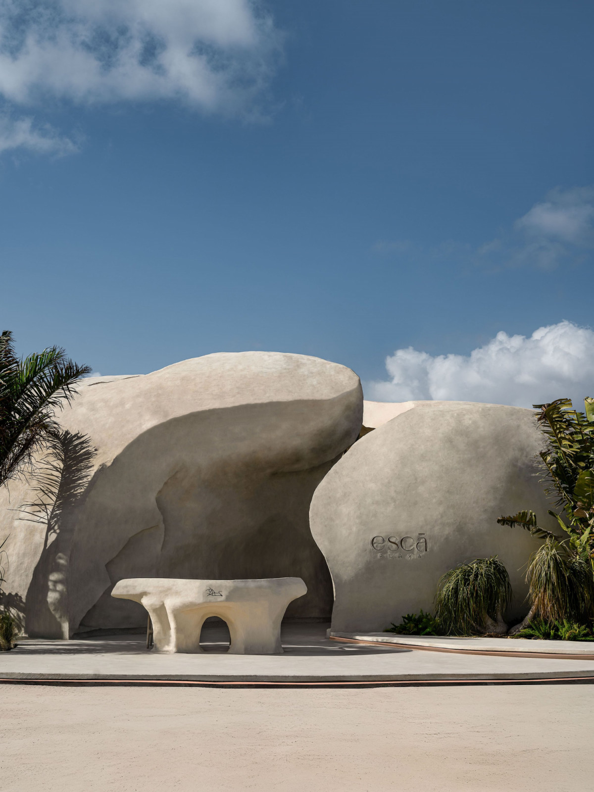 The entrance facade of Escā Playa, designed by Cairo-based architect Mohamed Badie, with its mineral-coated biomorphic forms rising from the sand at Ras El Hekma on Egypt’s Mediterranean coast (Photo: Nour El Refai)