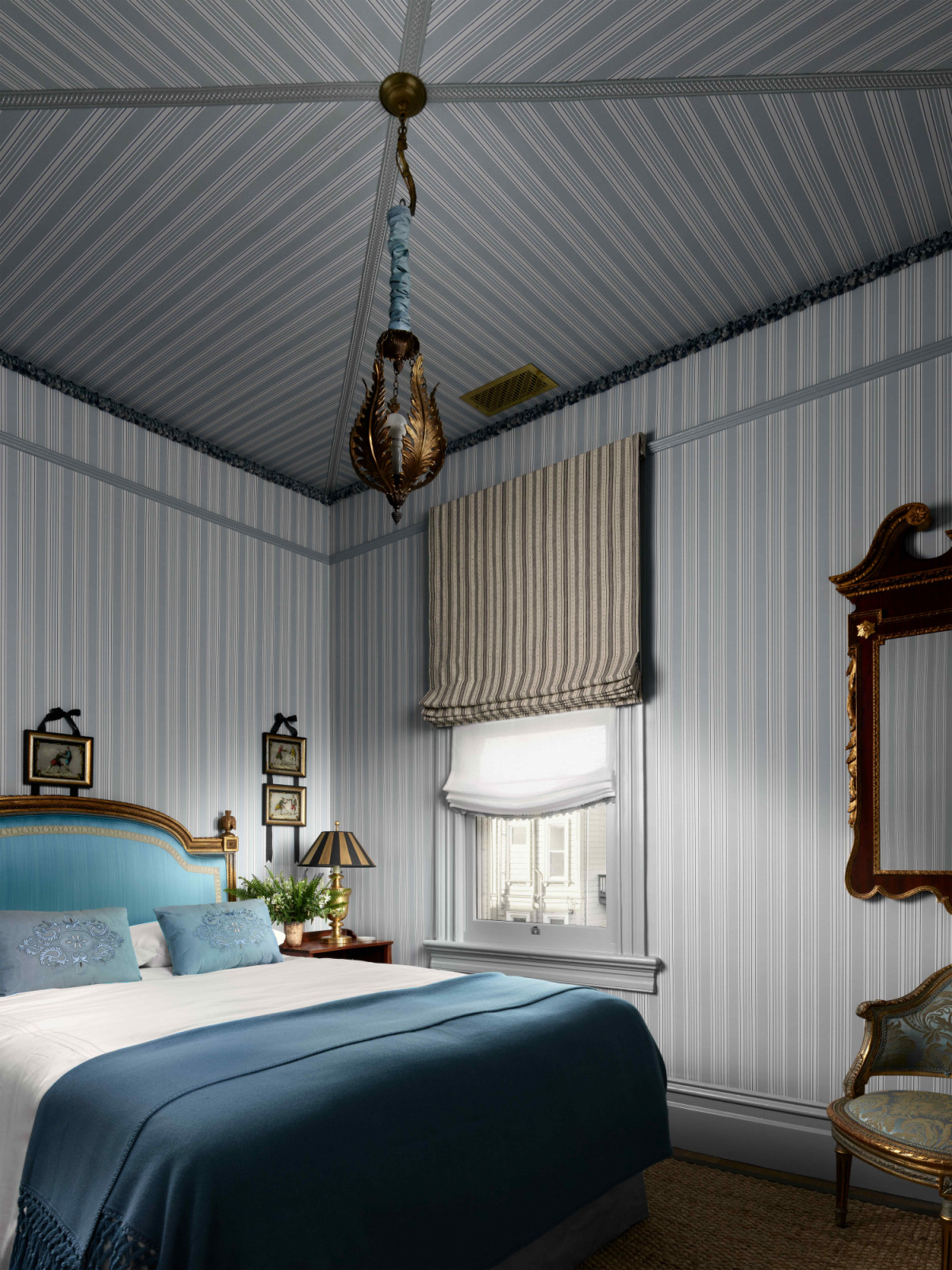 One of the guest bedrooms with a tented aesthetic
