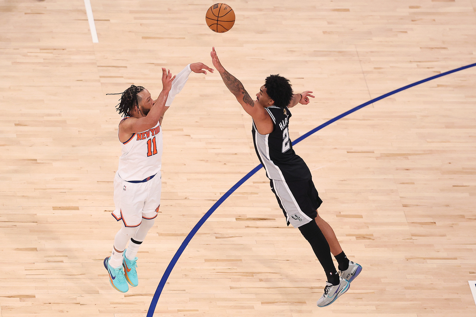 Jalen Brunson #11 of the New York Knicks shoots a three-point basket over Dylan Harper #2 of the San Antonio Spurs during the fourth quarter in Game Three of the 2026 NBA Finals at Madison Square Garden on June 08, 2026 in New York City (Photo: Dustin Satloff/Getty Images)