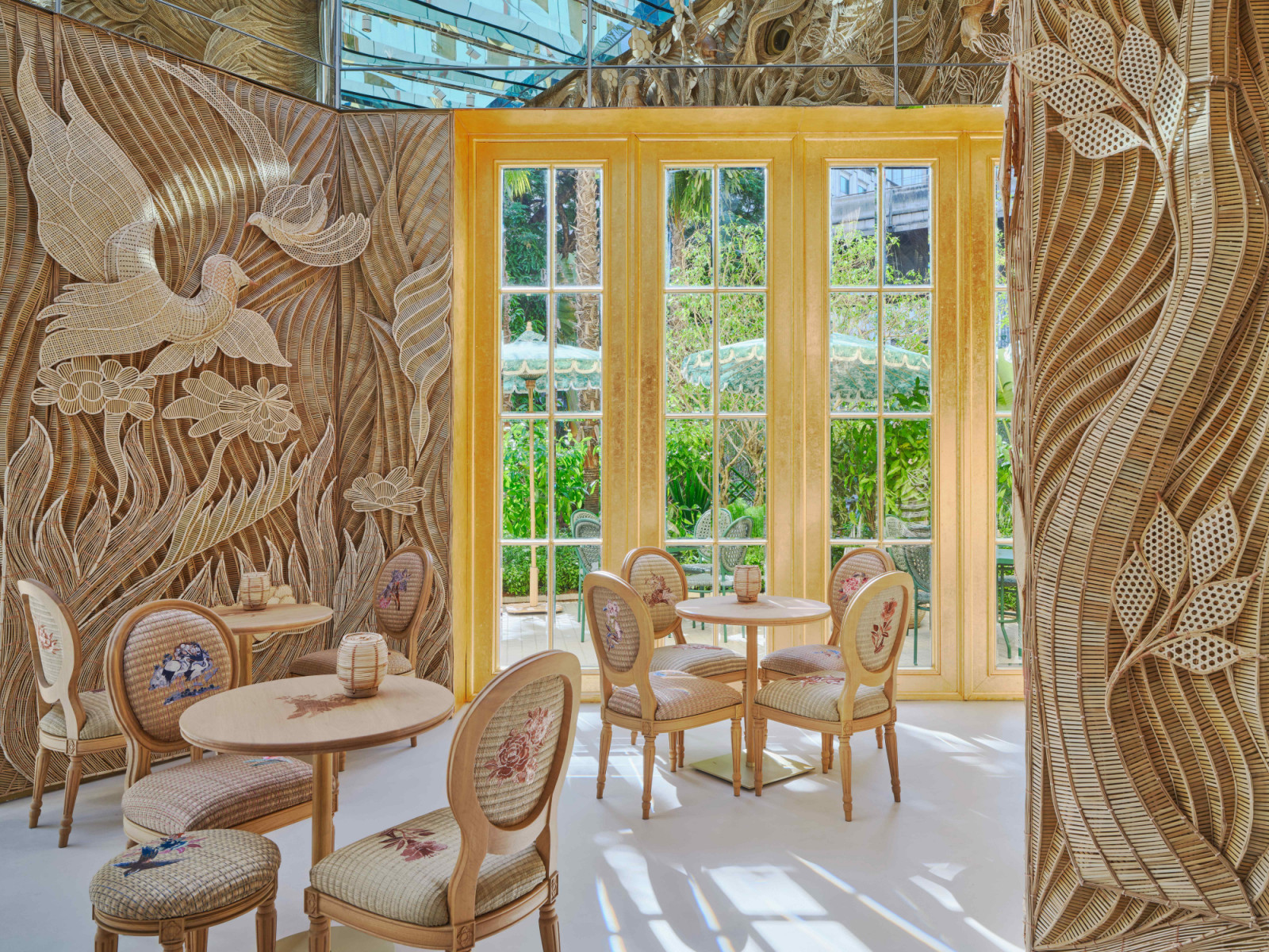 the bamboo installation brings flora and fauna to life