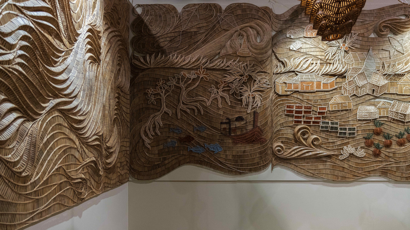 The corridors echo the seascapes of the Ban Laem district in Thailand, crafted from bamboo, rattan, vine, and grass
